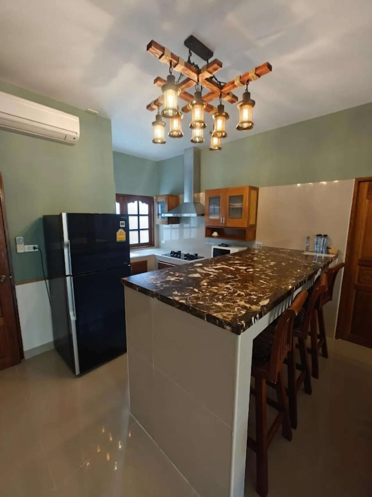 Kitchen or kitchenette in Namphung Phuket Boutique Resort