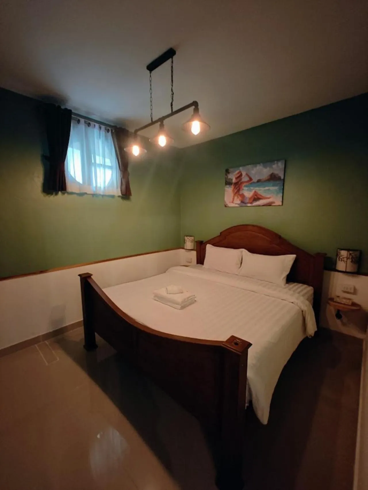 Bed in Namphung Phuket Boutique Resort