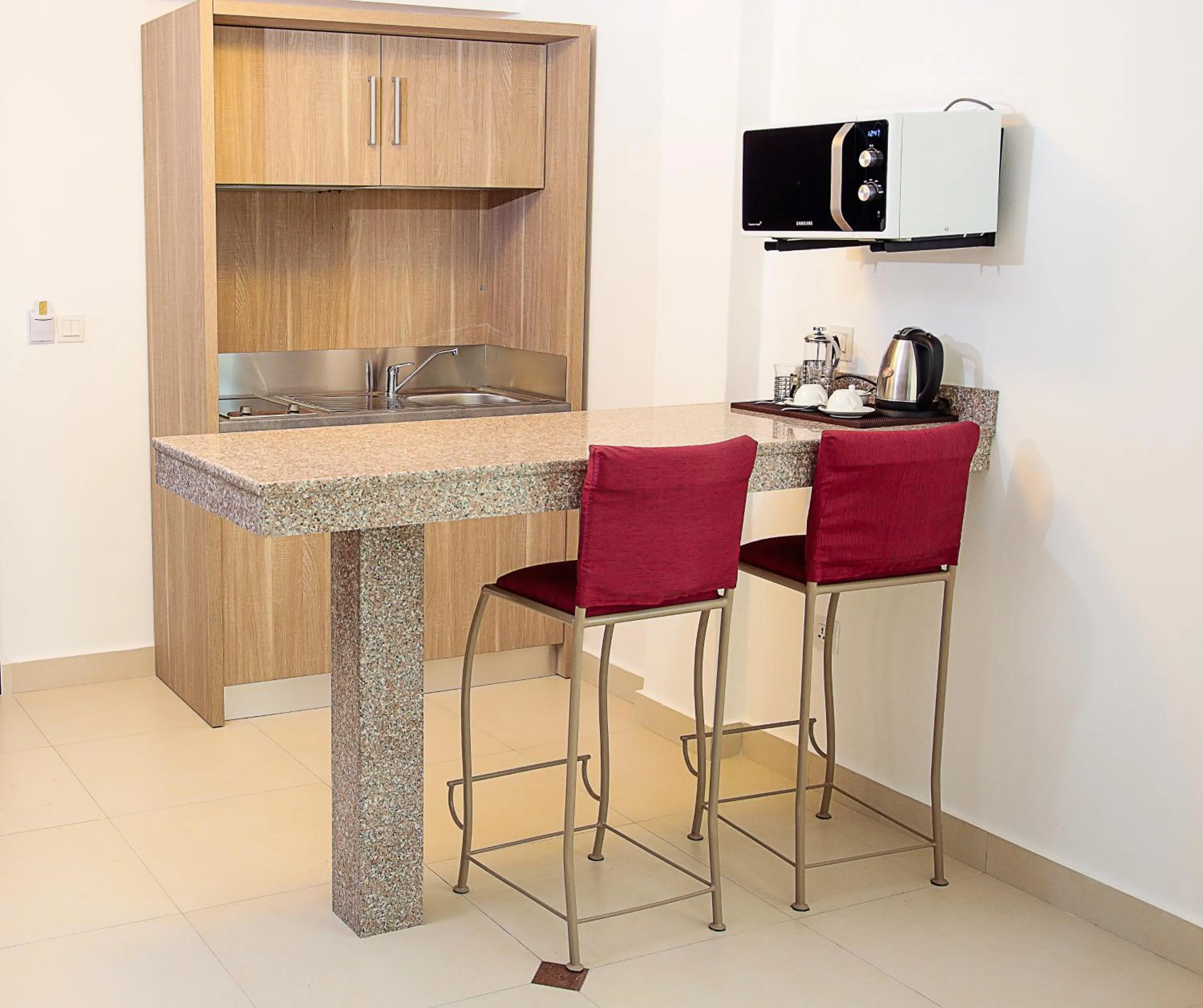 Kitchen or kitchenette in Kiriri Garden Hotel