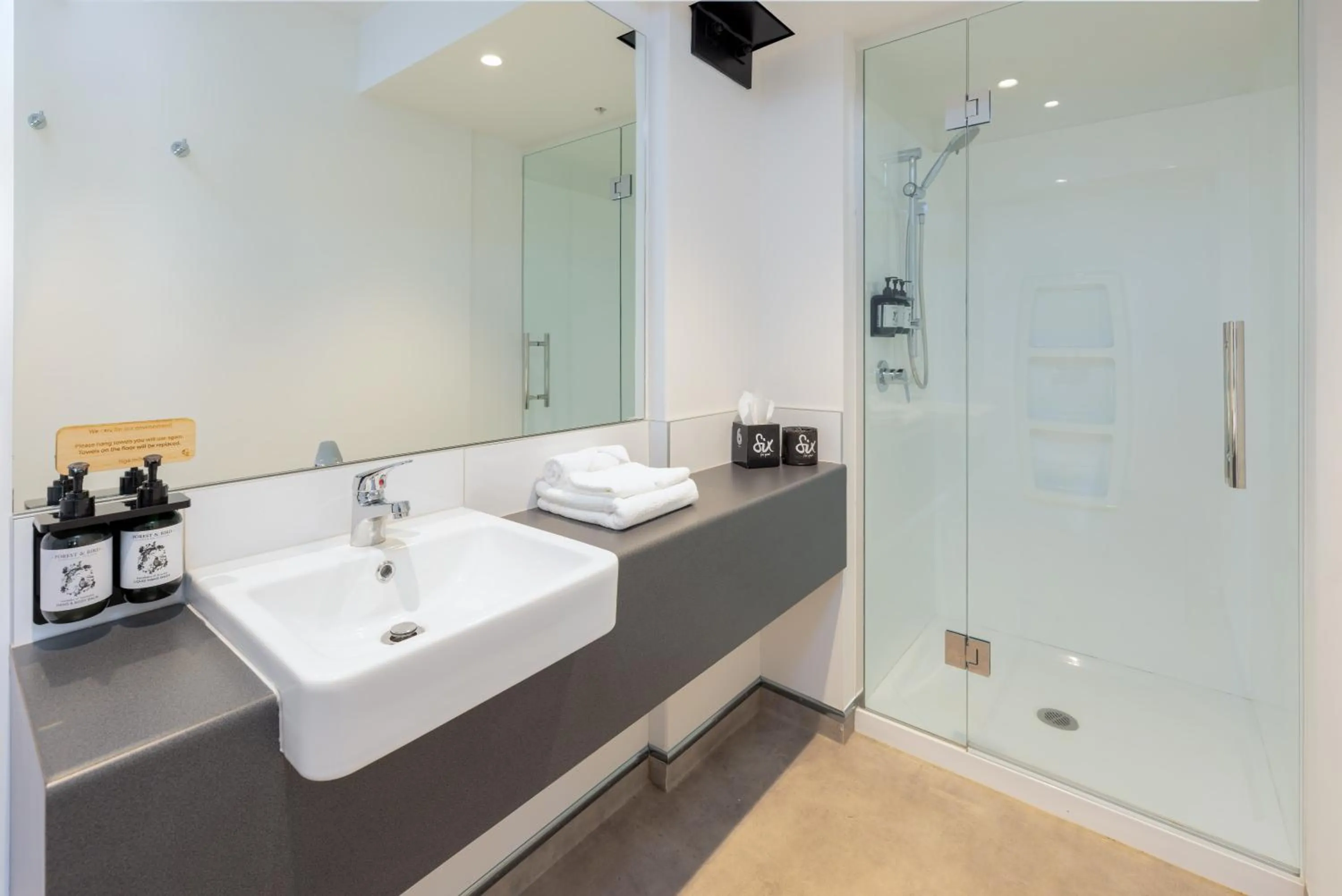 Bathroom in Hotel Give