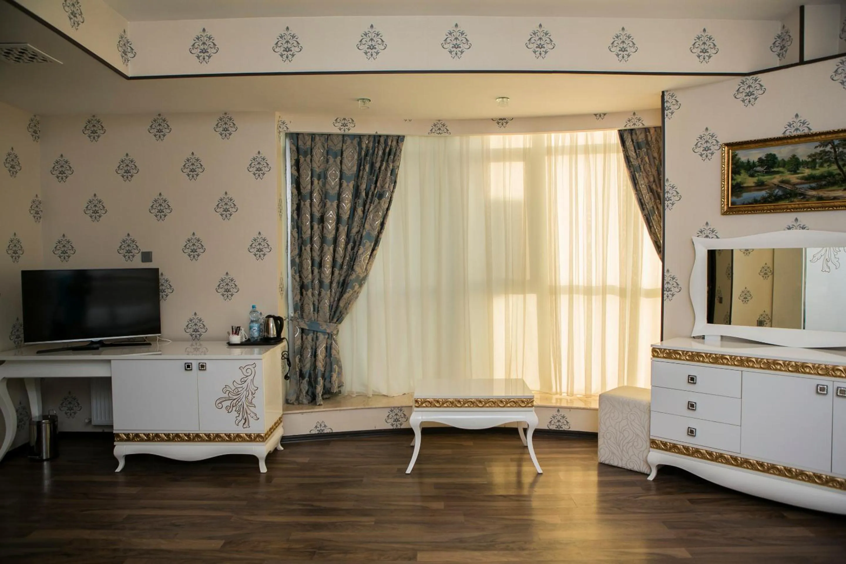 Photo of the whole room in Azalea Hotel Baku