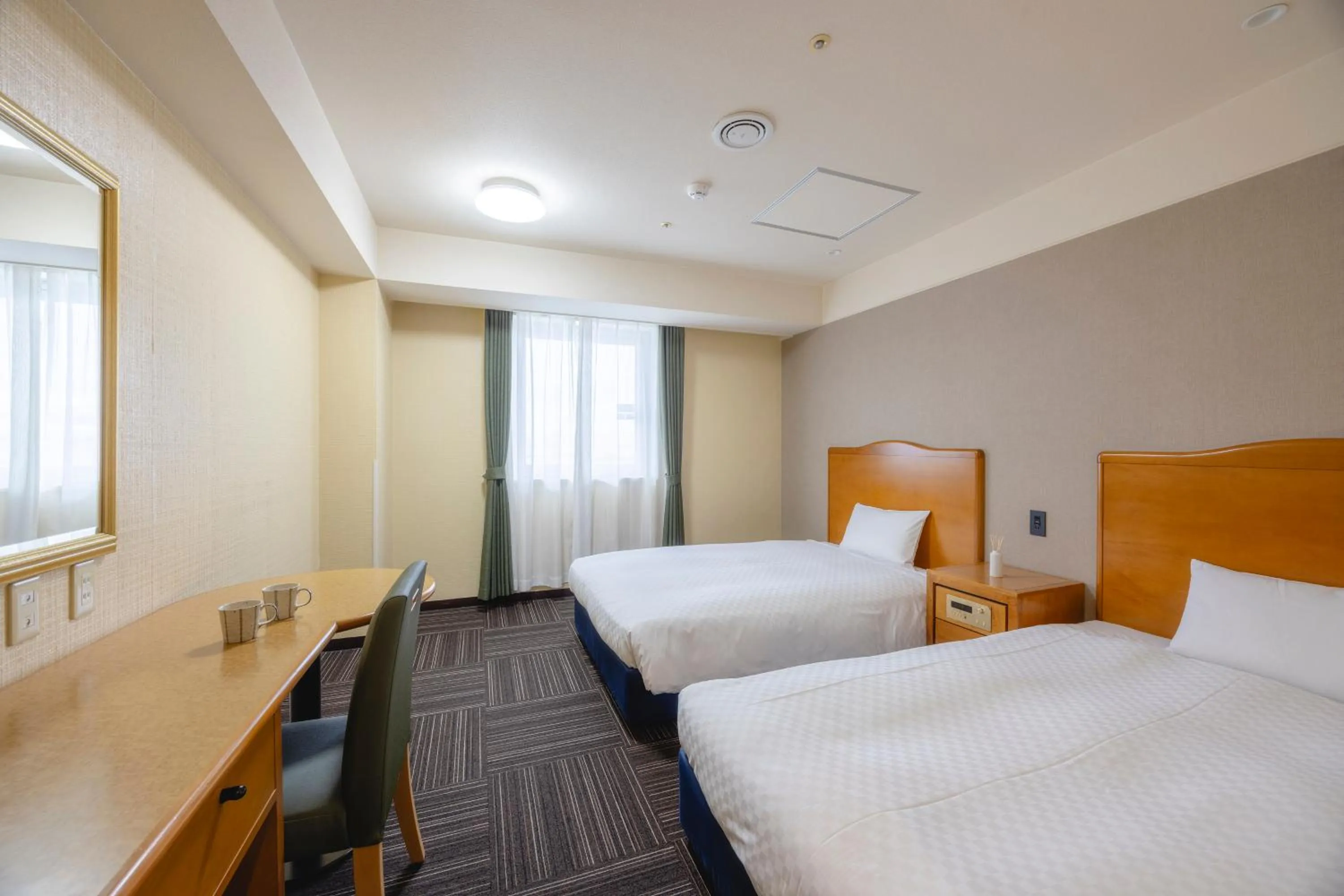 Bed in Kanku Izumiotsu Washington Hotel