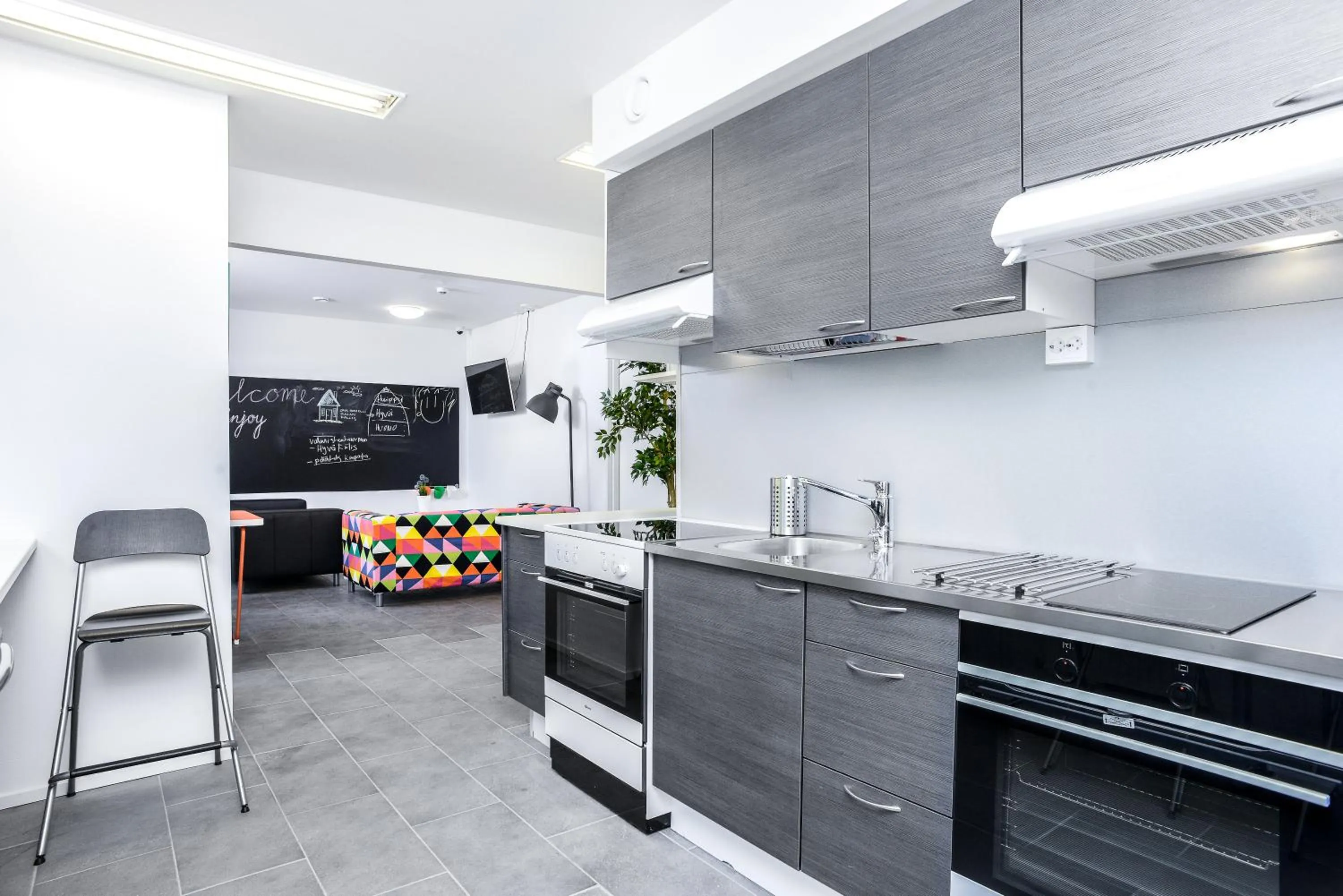 Communal kitchen in Forenom Hostel Vantaa Aviapolis