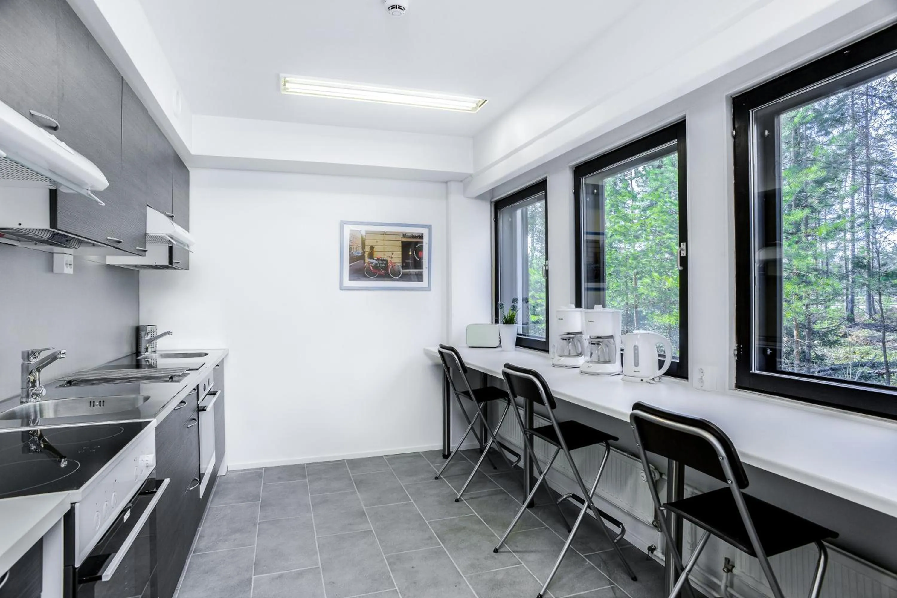 Communal kitchen in Forenom Hostel Vantaa Aviapolis