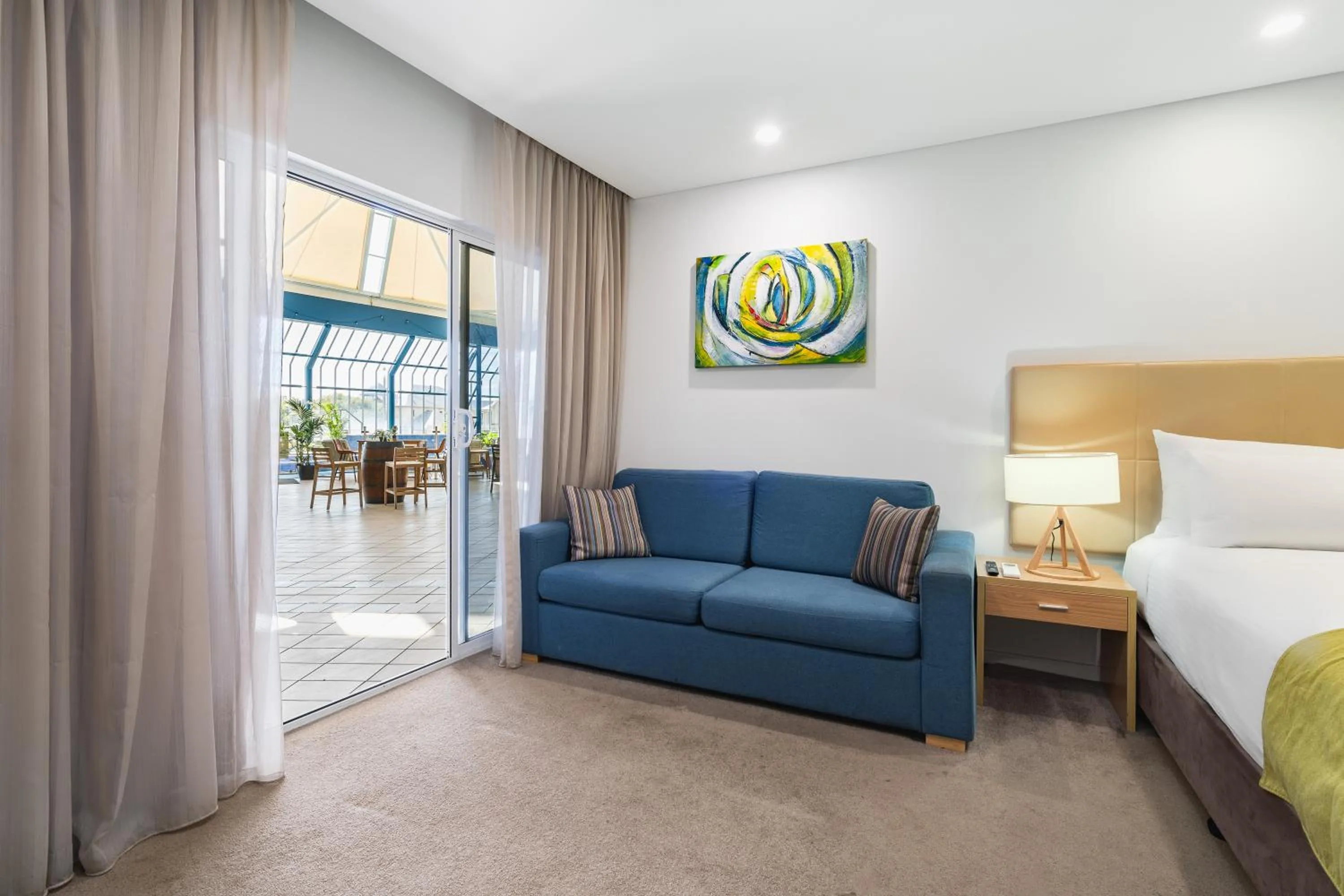 Seating area, Bed in Mantra Bunbury