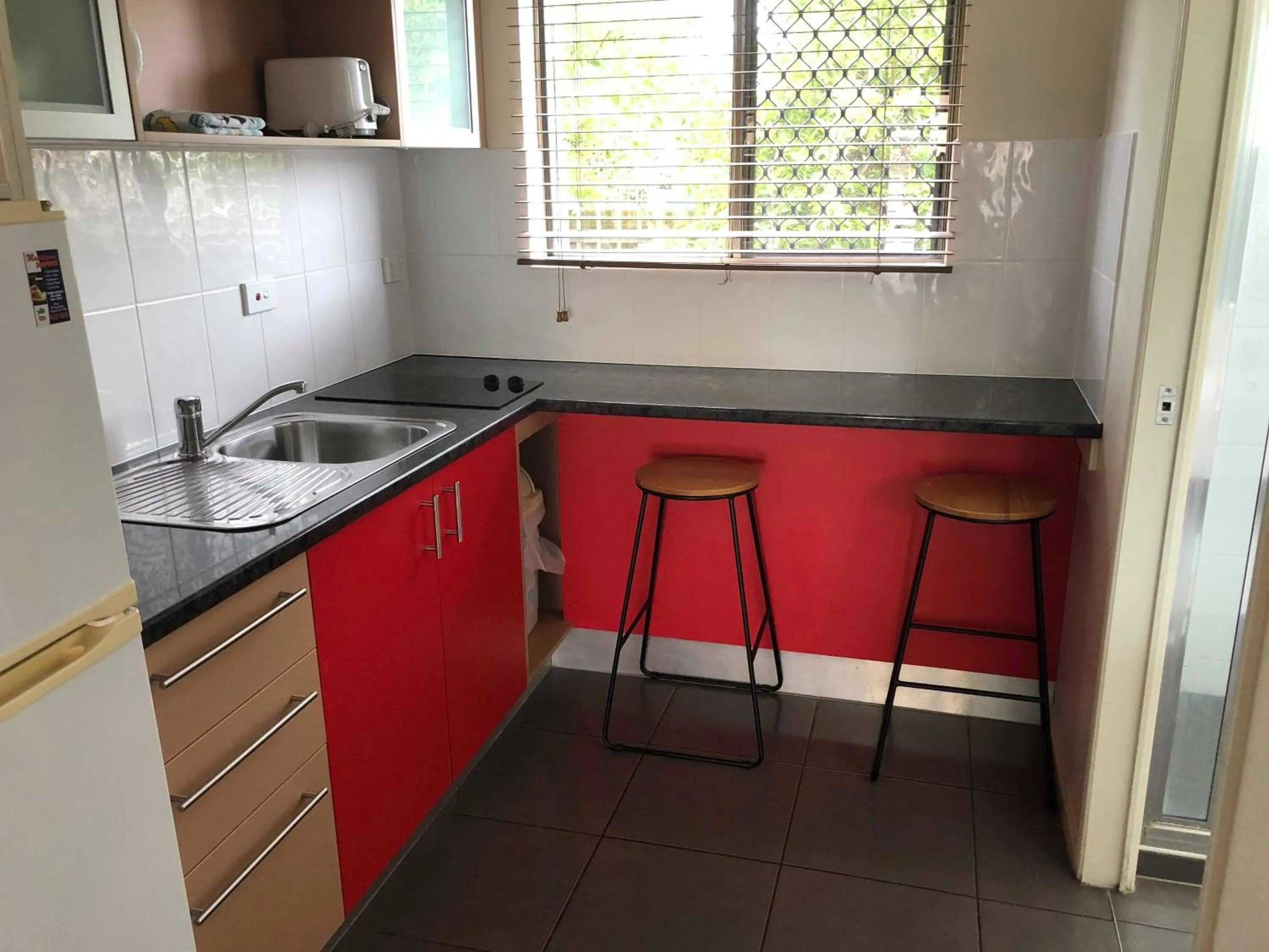 Kitchen or kitchenette in Hervey Bay Motel