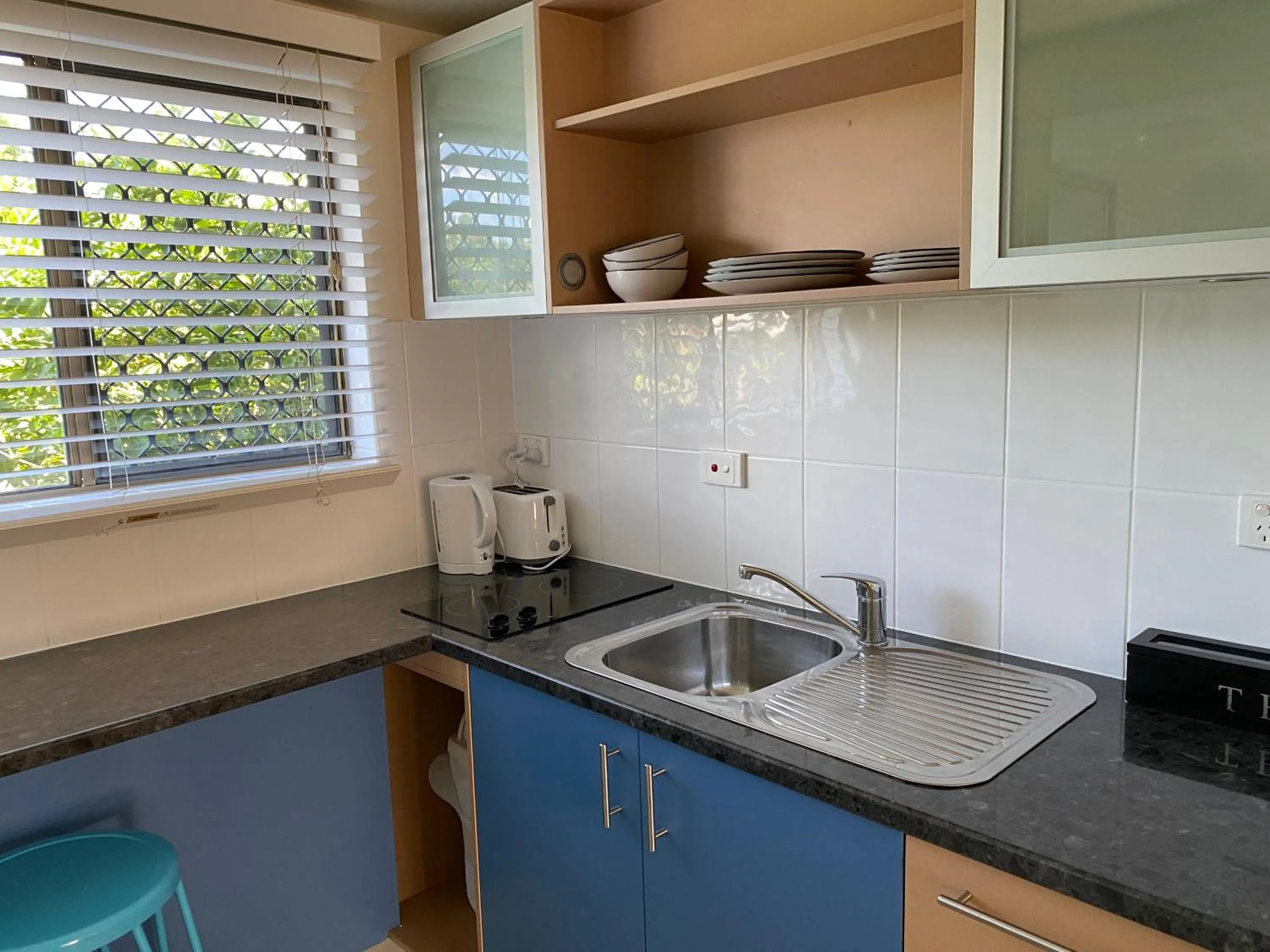 Kitchen or kitchenette in Hervey Bay Motel