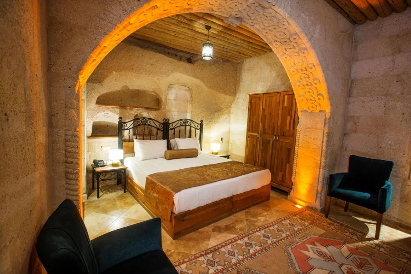 Bed in Caldera Cave Hotel