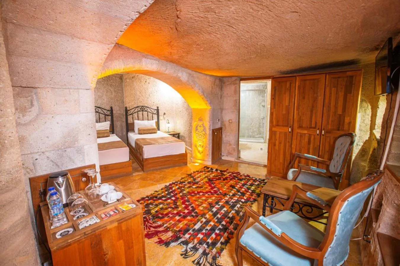 Bed in Caldera Cave Hotel