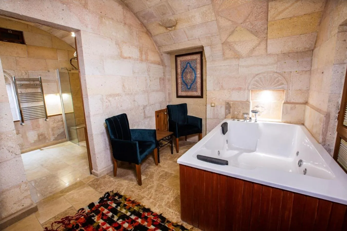 Hot Tub, Bed in Caldera Cave Hotel