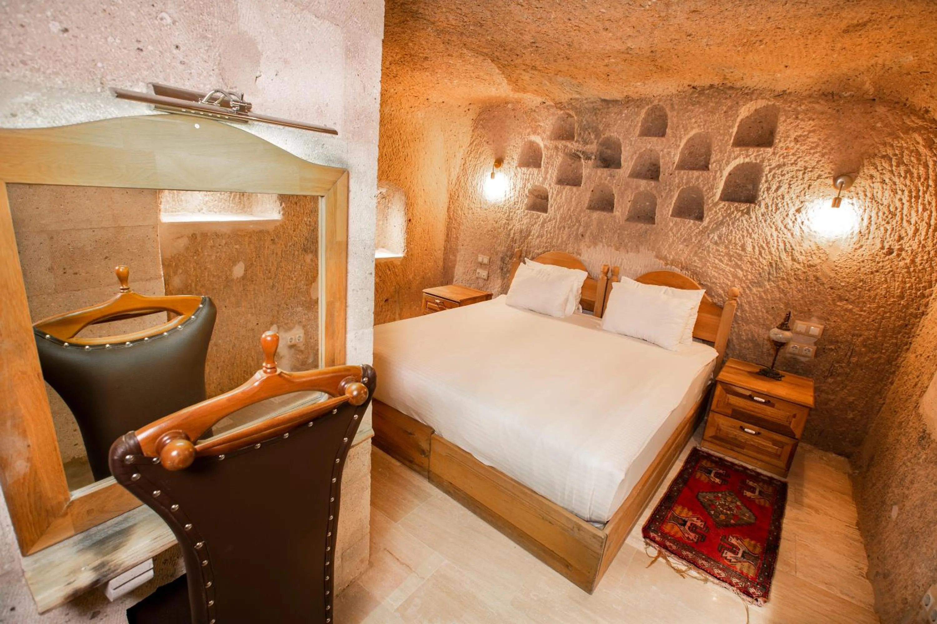 Bed in Caldera Cave Hotel
