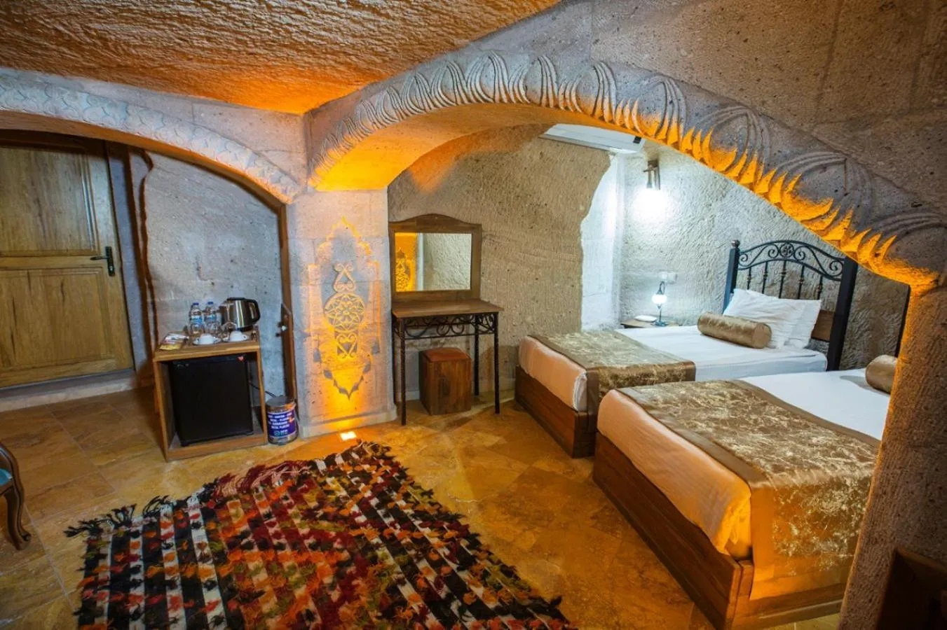 Bed in Caldera Cave Hotel