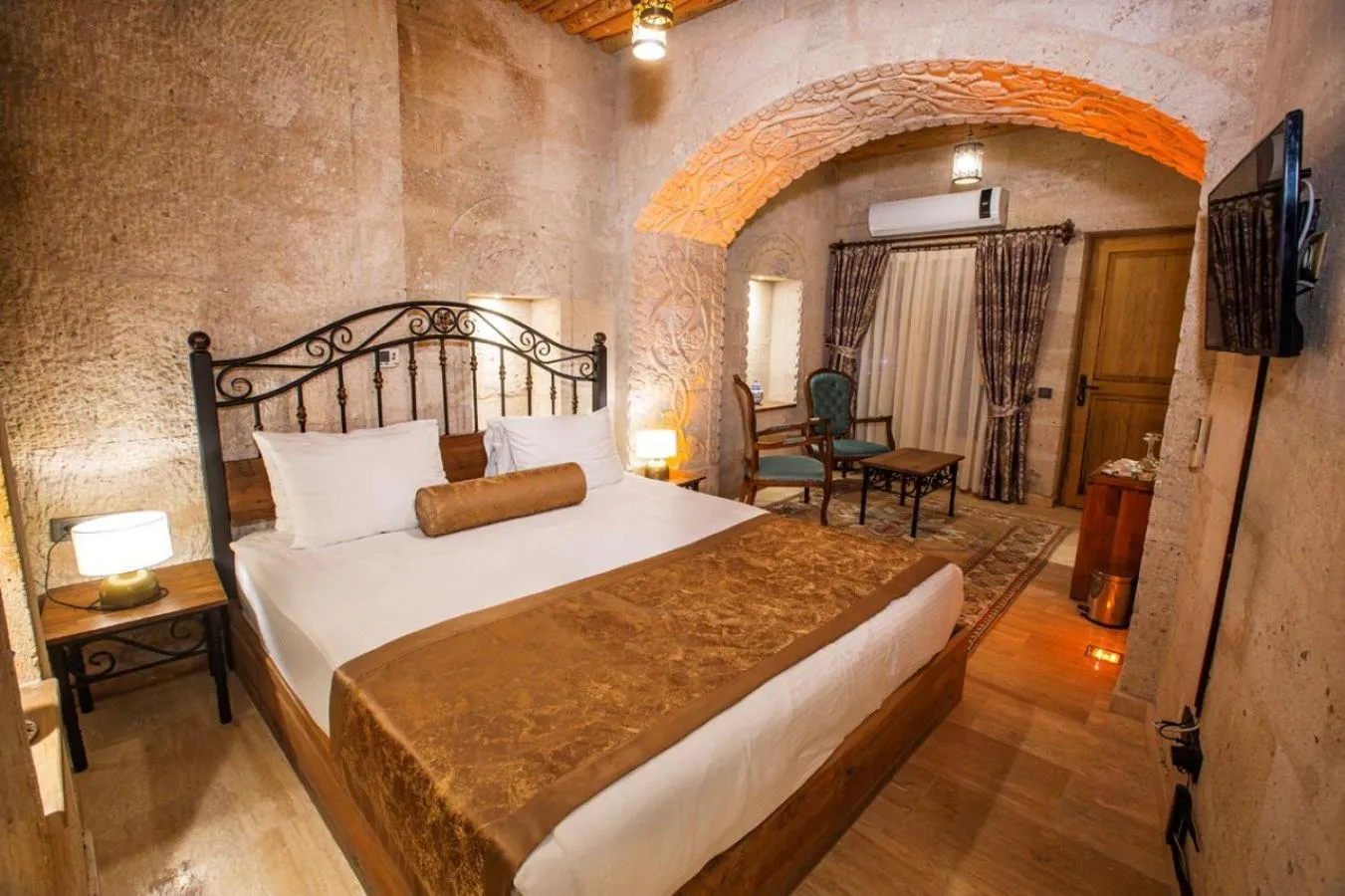 Bed in Caldera Cave Hotel