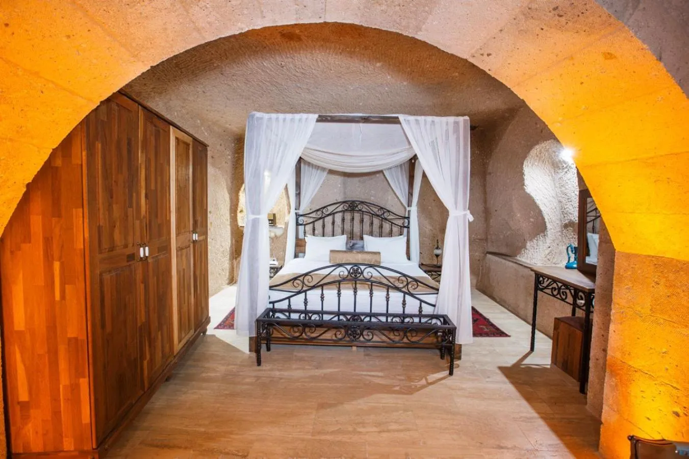 Bed in Caldera Cave Hotel
