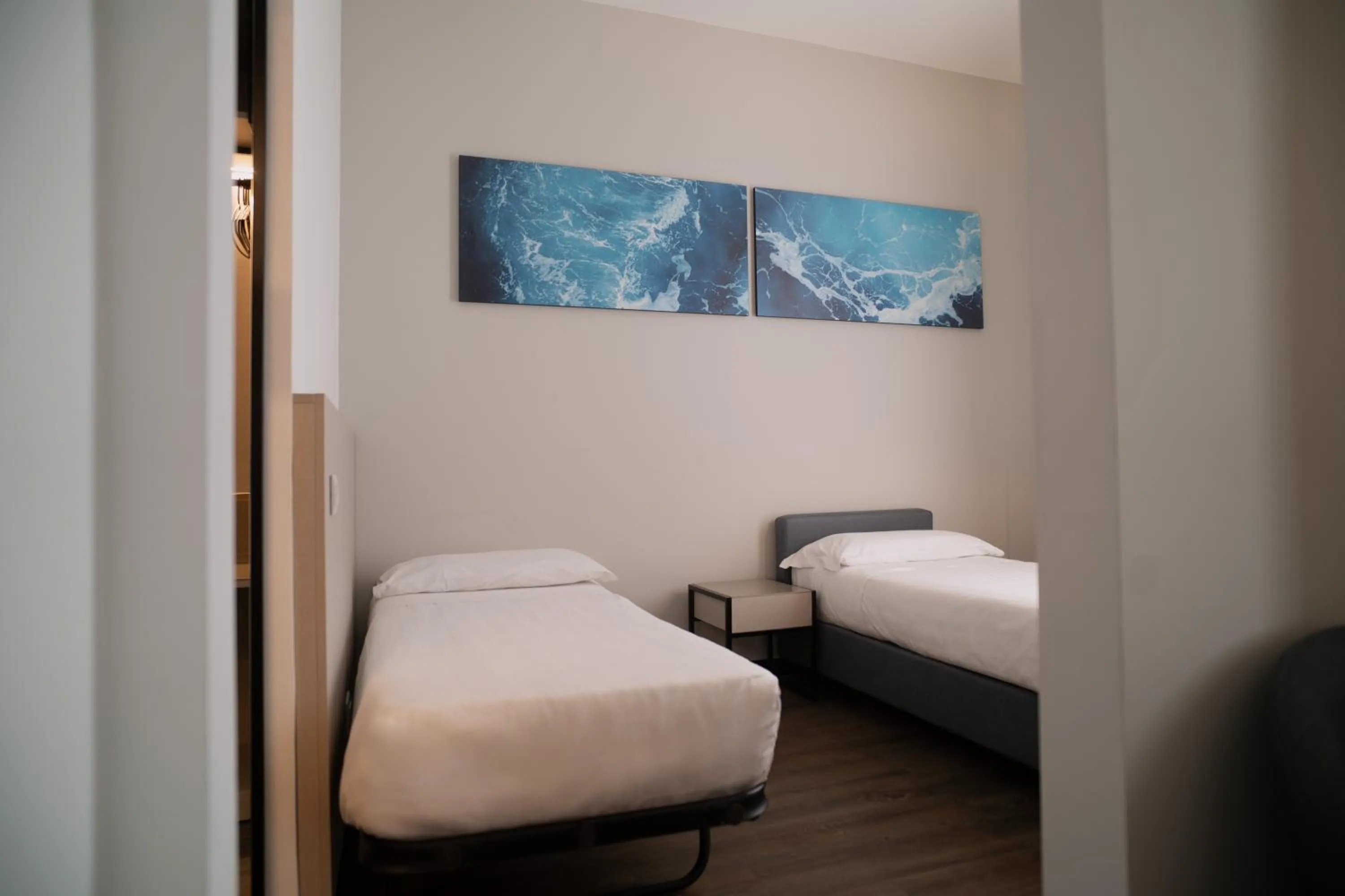 Bed in Sea Lion Hotel