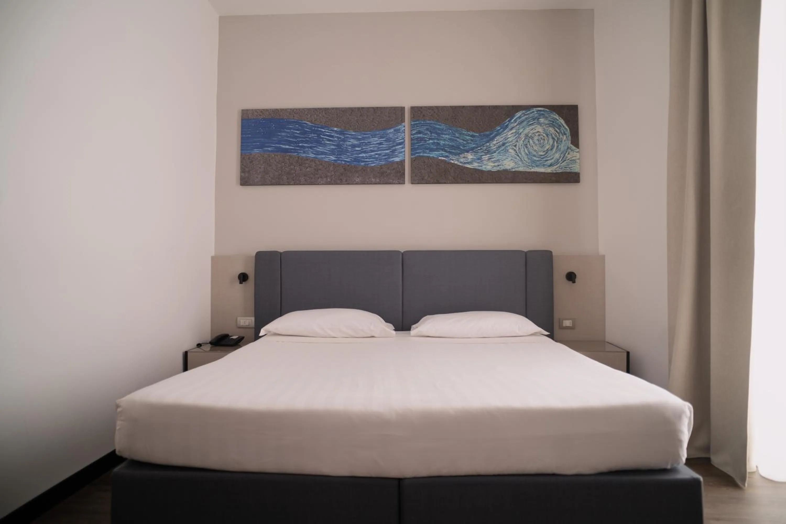 Bed in Sea Lion Hotel