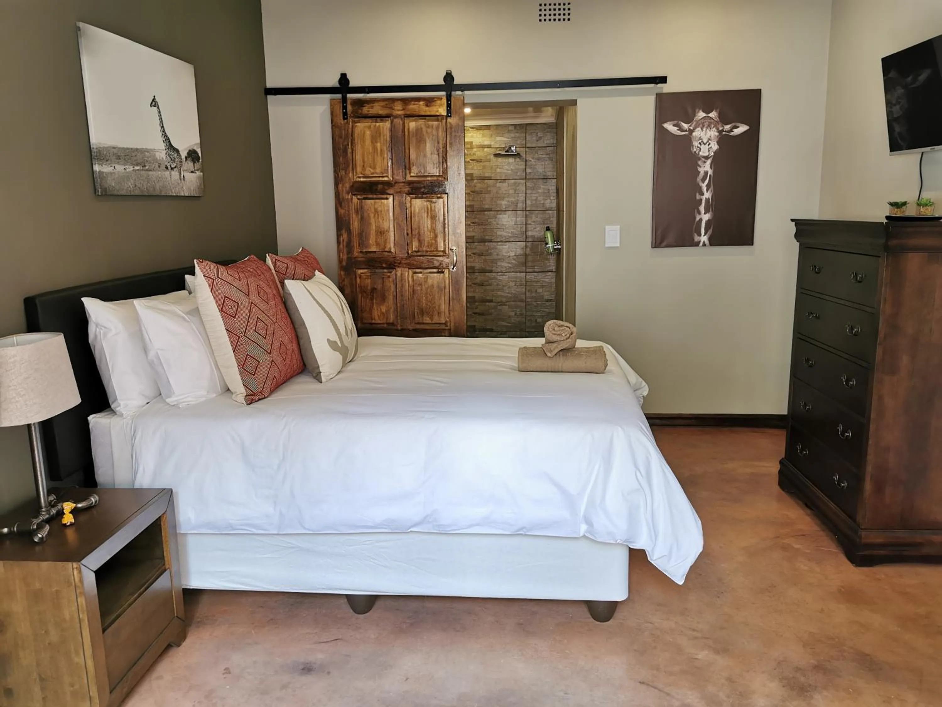 Bed in Aerotropolis Guest Lodge