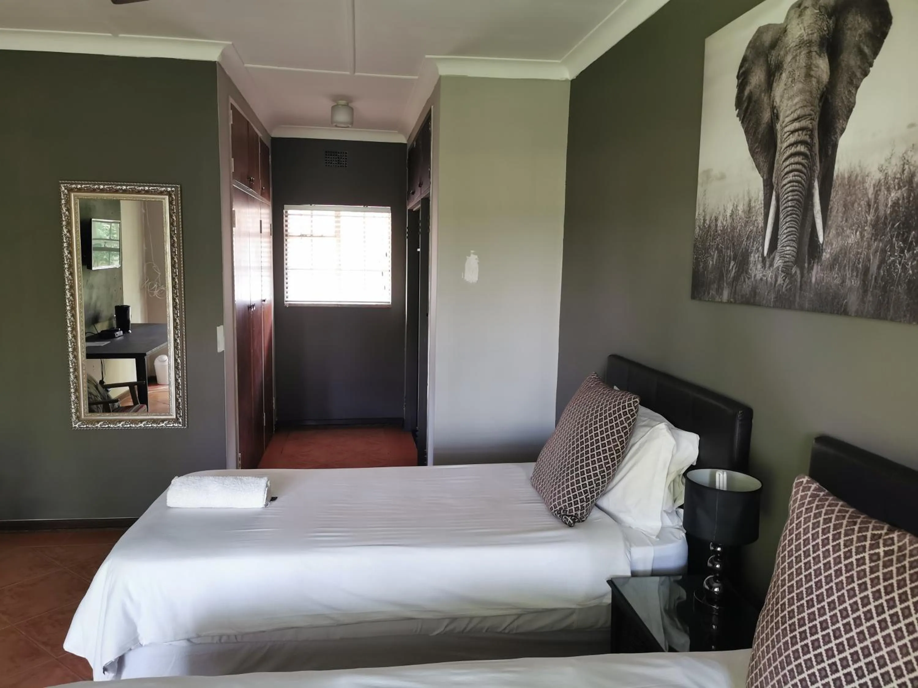 Bed in Aerotropolis Guest Lodge