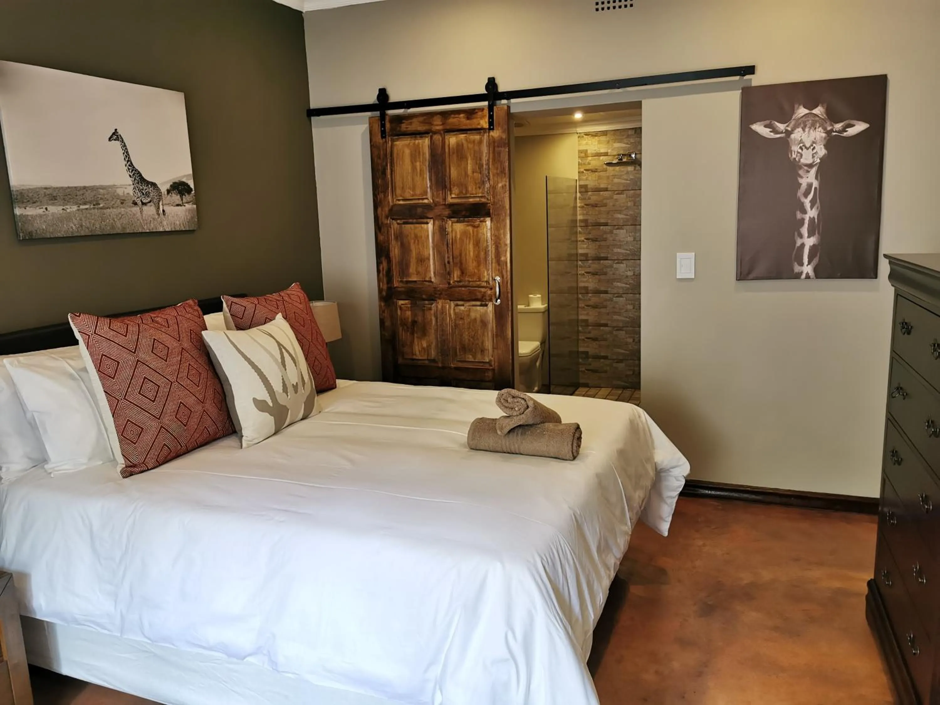 Bed in Aerotropolis Guest Lodge