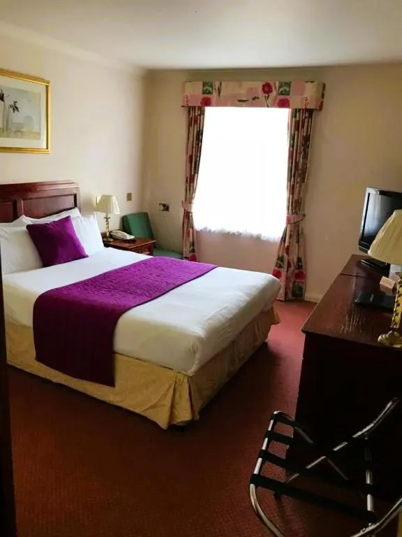 Bed in La Trelade Hotel