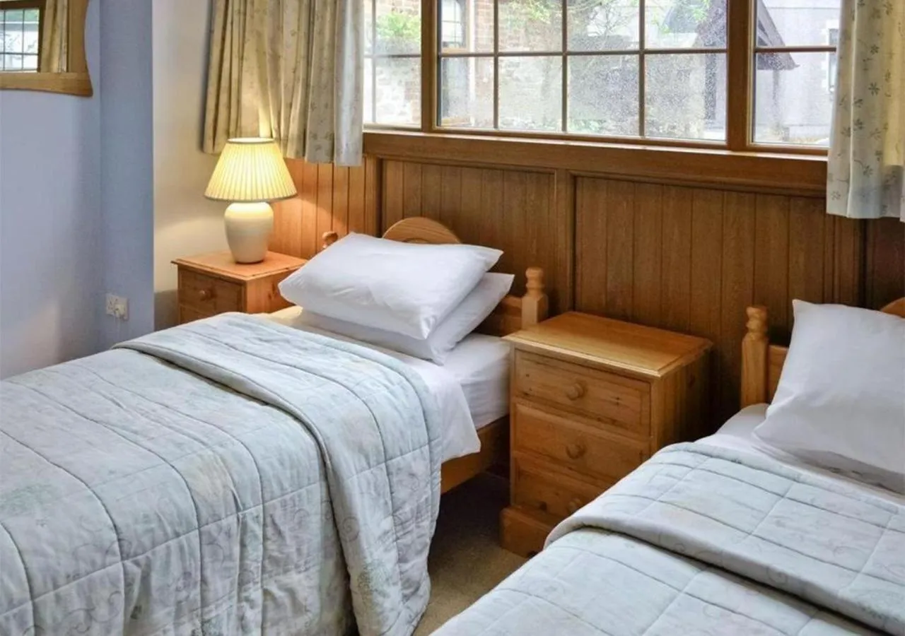 Bed in Penmorvah Manor Hotel