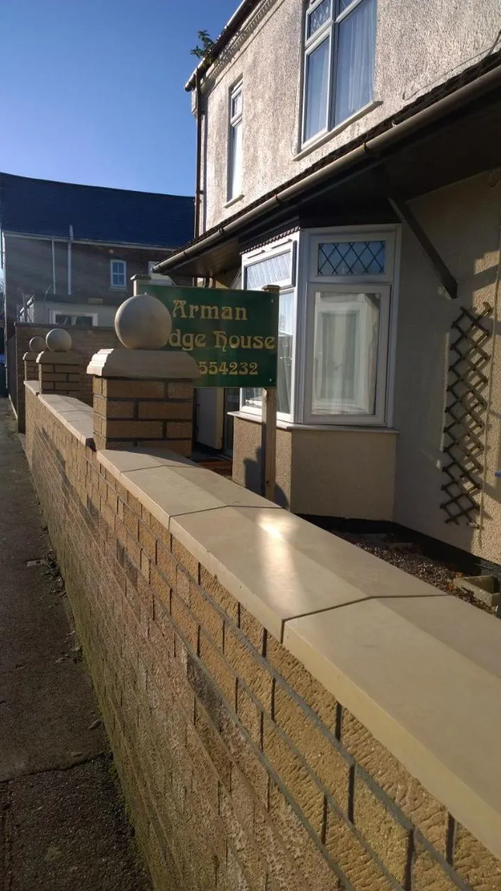 Property logo or sign in Arman Lodge House