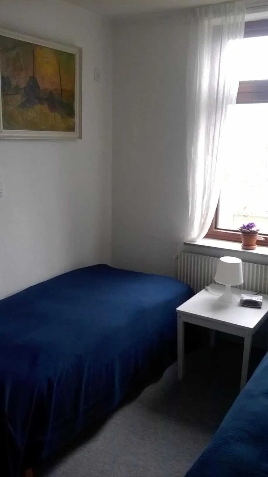 Bedroom in Pasescia Bed and Breakfast.