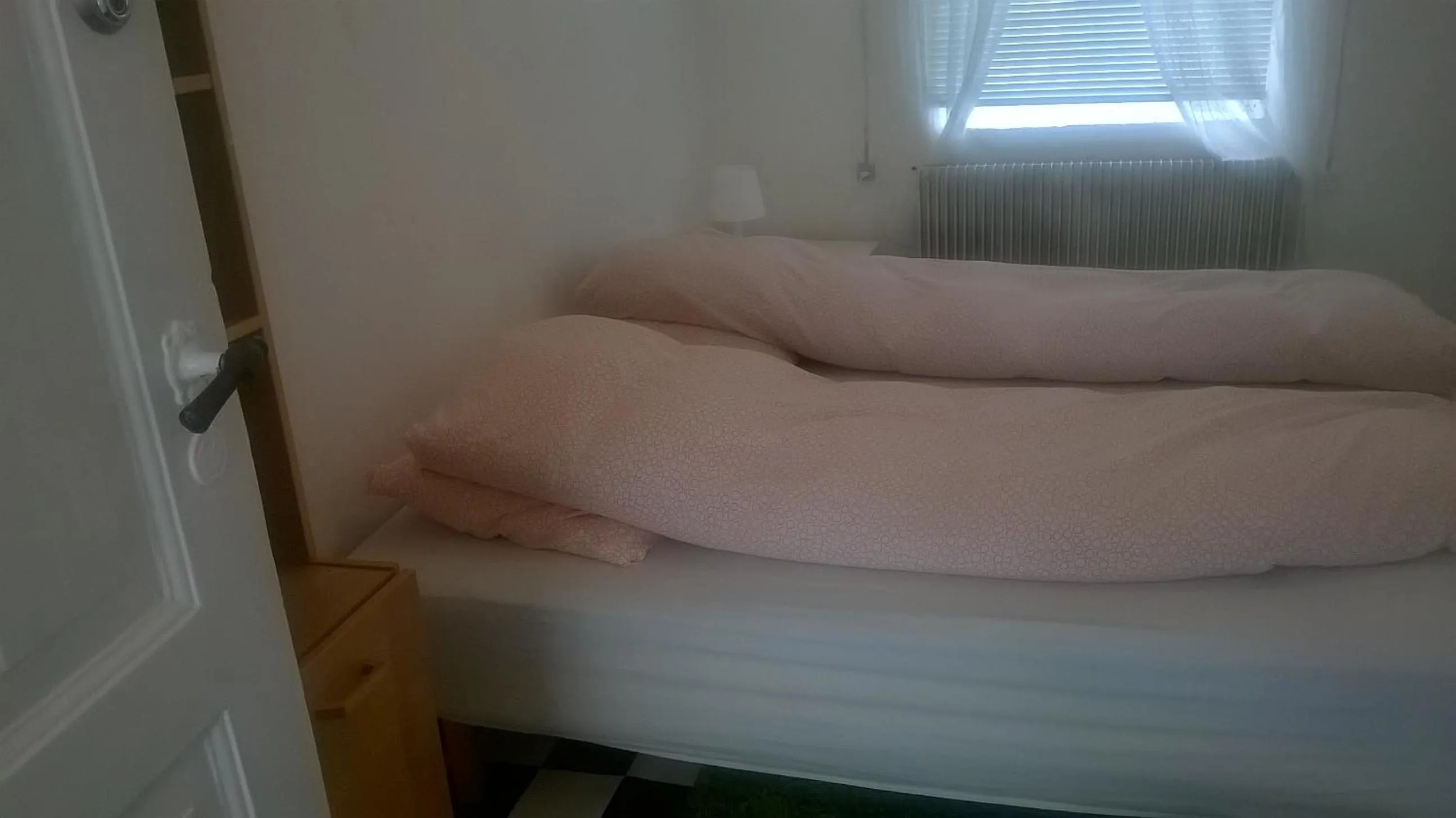 Bedroom in Pasescia Bed and Breakfast.