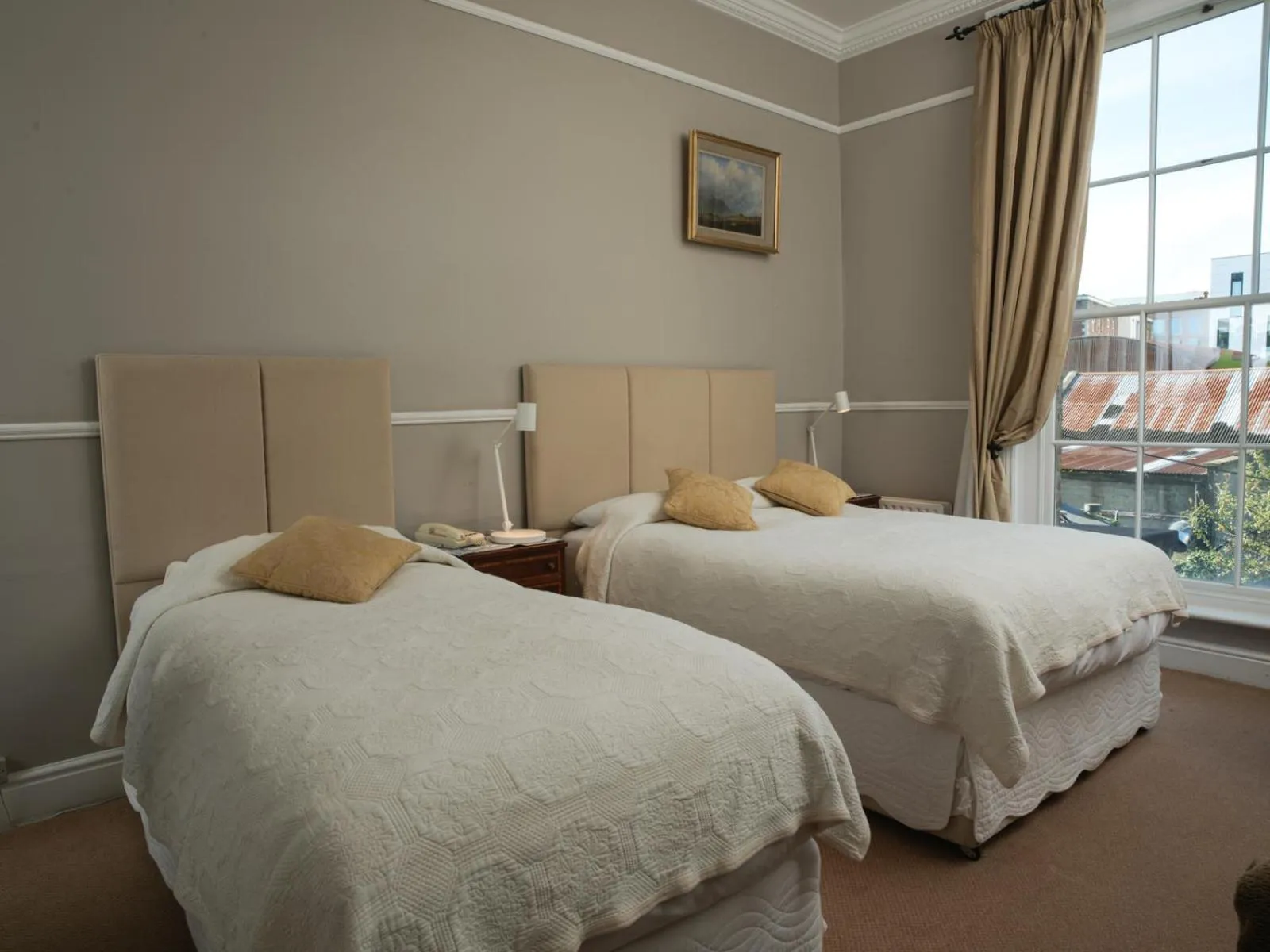 Bed in Harveys Guest House