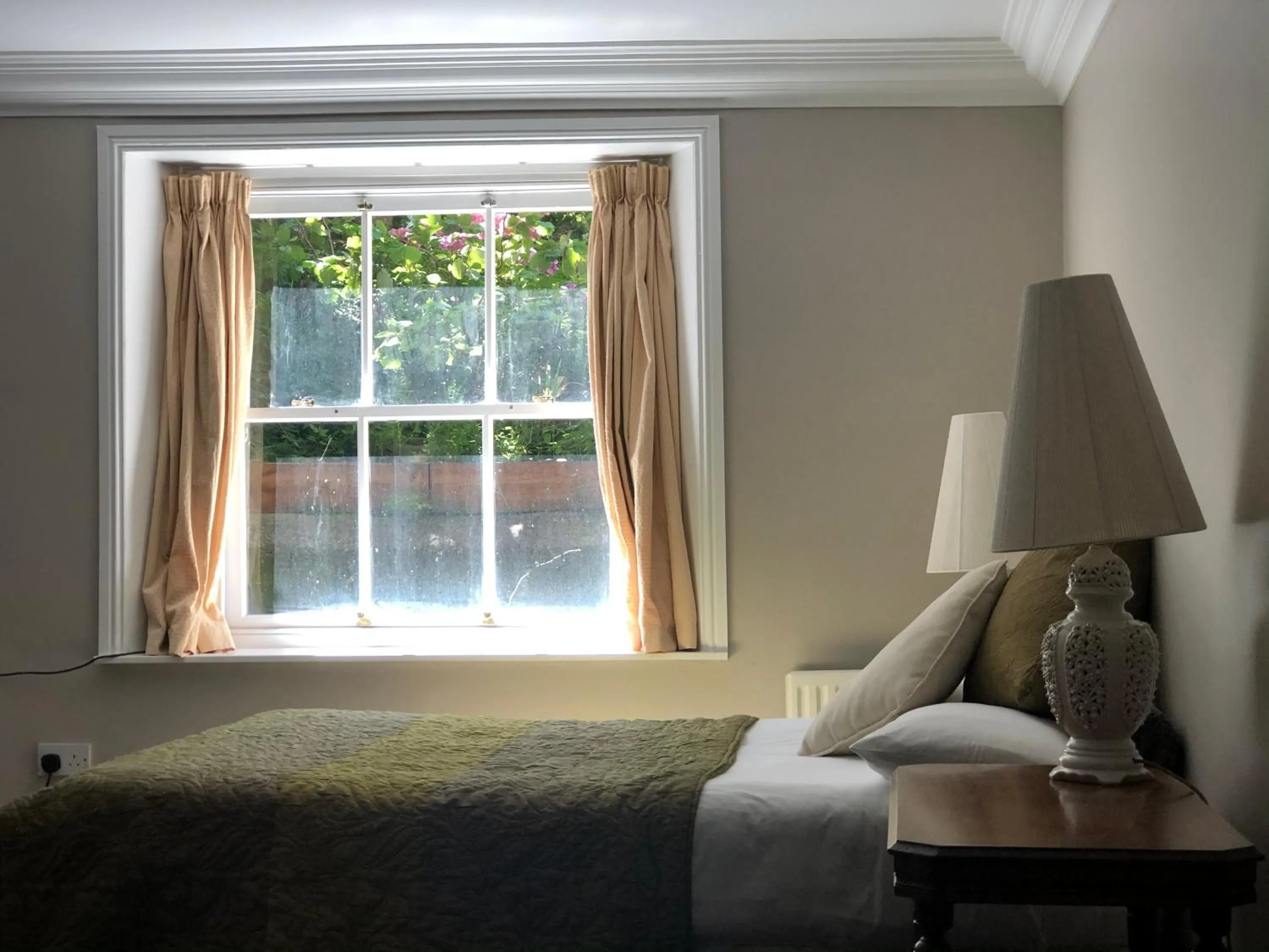 Bed in Harveys Guest House