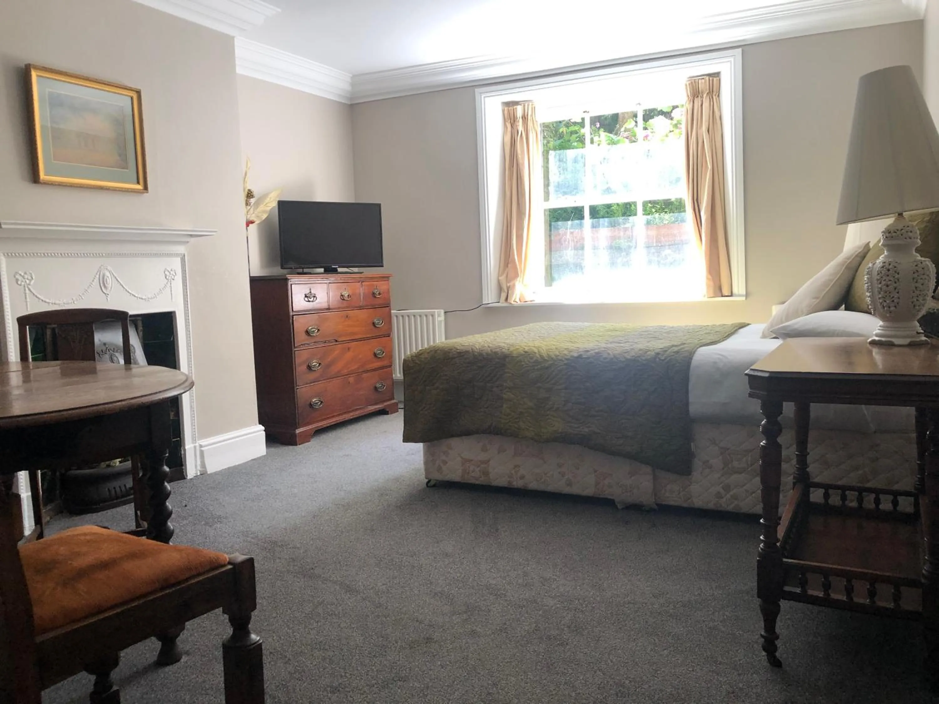 Bed in Harveys Guest House