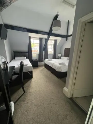 Bed in Antrobus Hotel