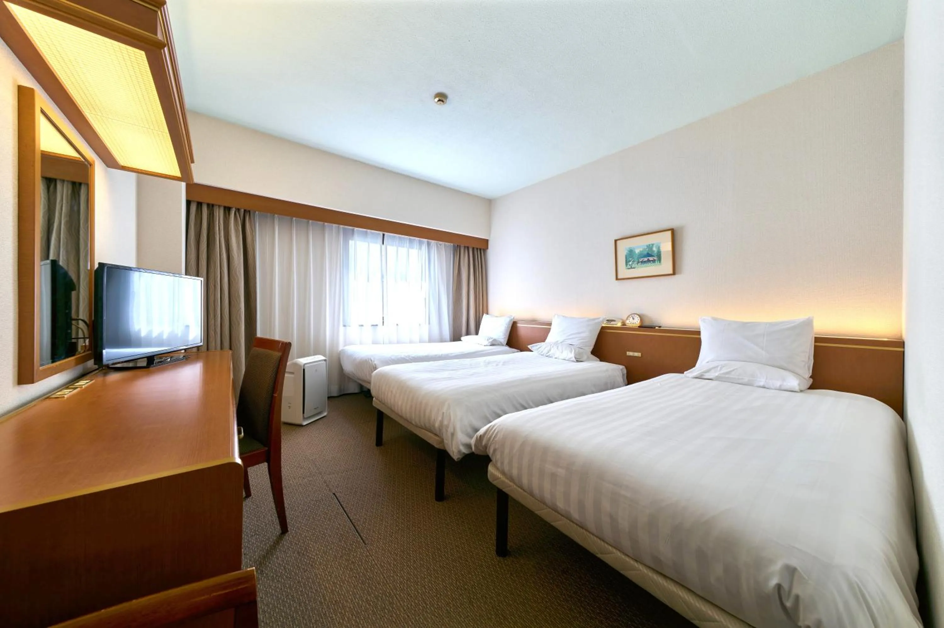 Bed in Daiichi Inn Ikebukuro