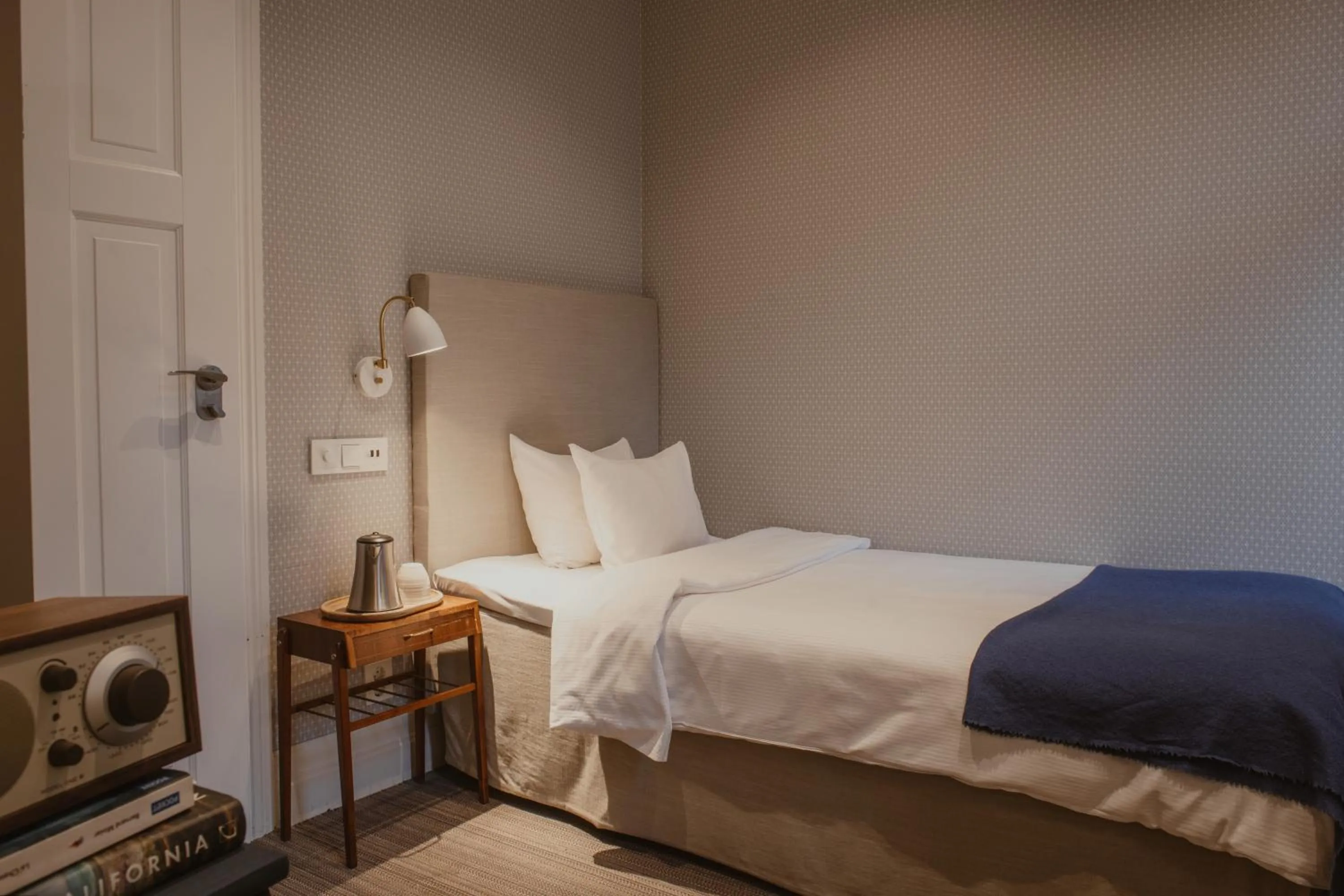 Bed in Home Hotel Wellington