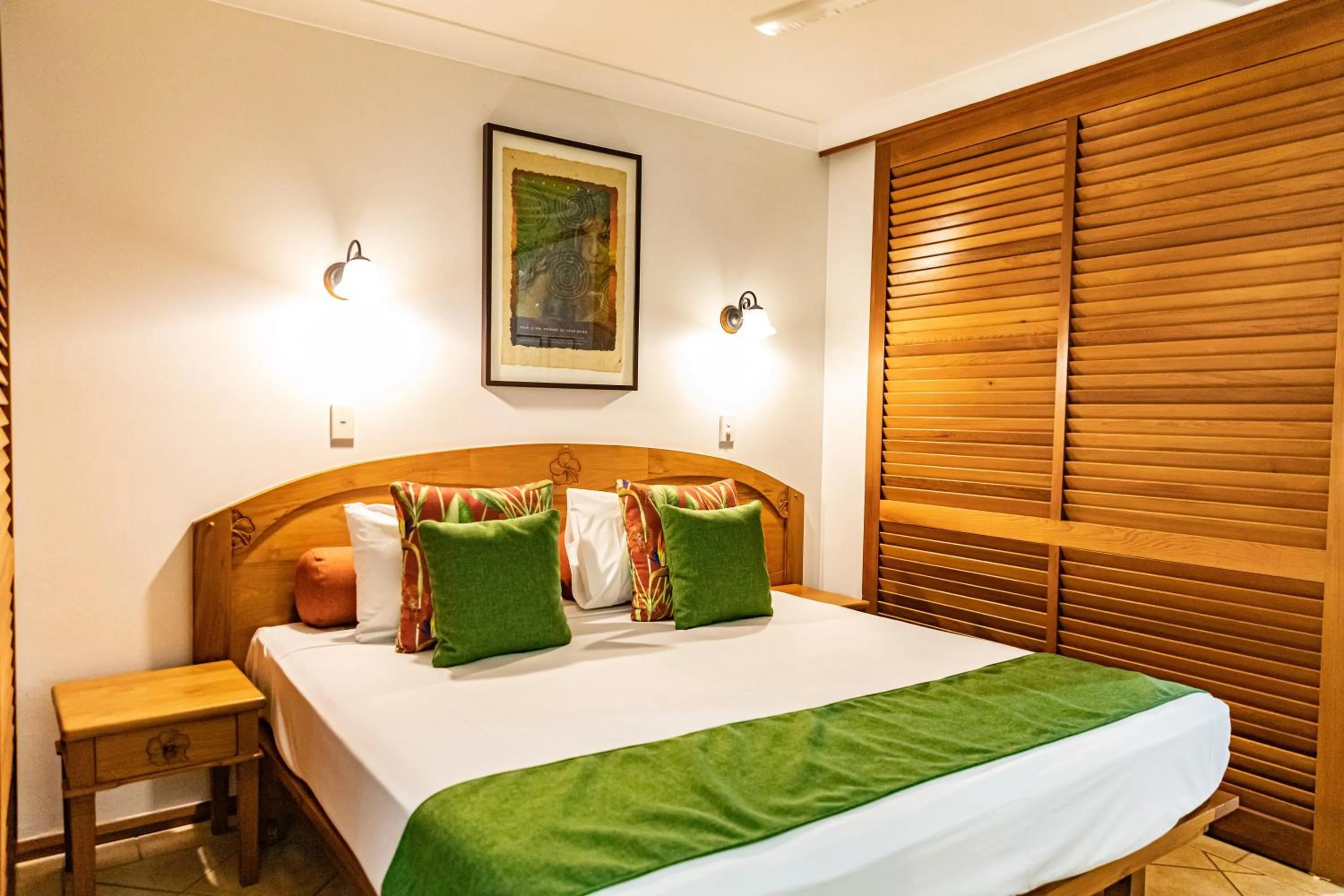 Bed in Hibiscus Resort & Spa - Official Onsite Reception & Check In