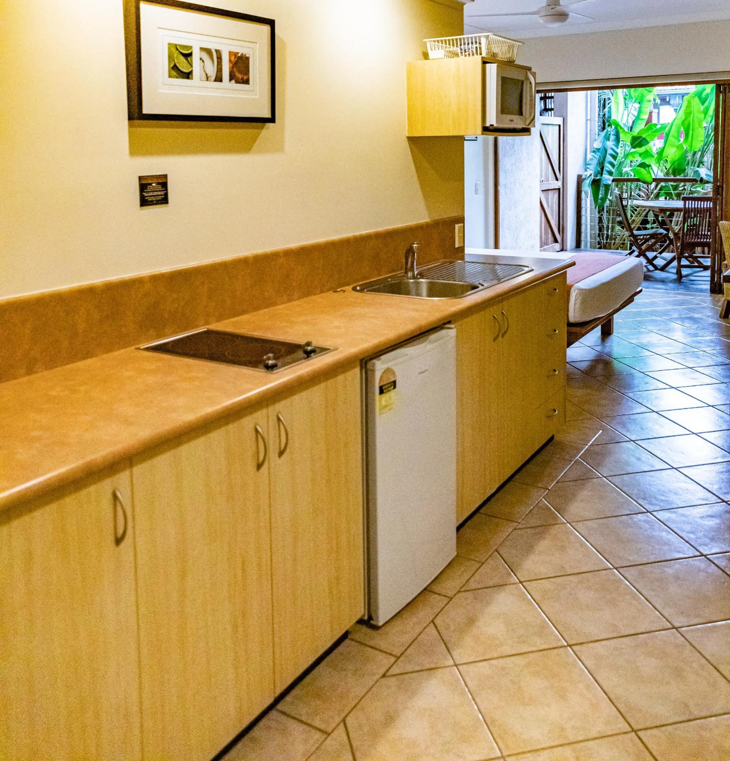 Kitchen or kitchenette in Hibiscus Resort & Spa - Official Onsite Reception & Check In