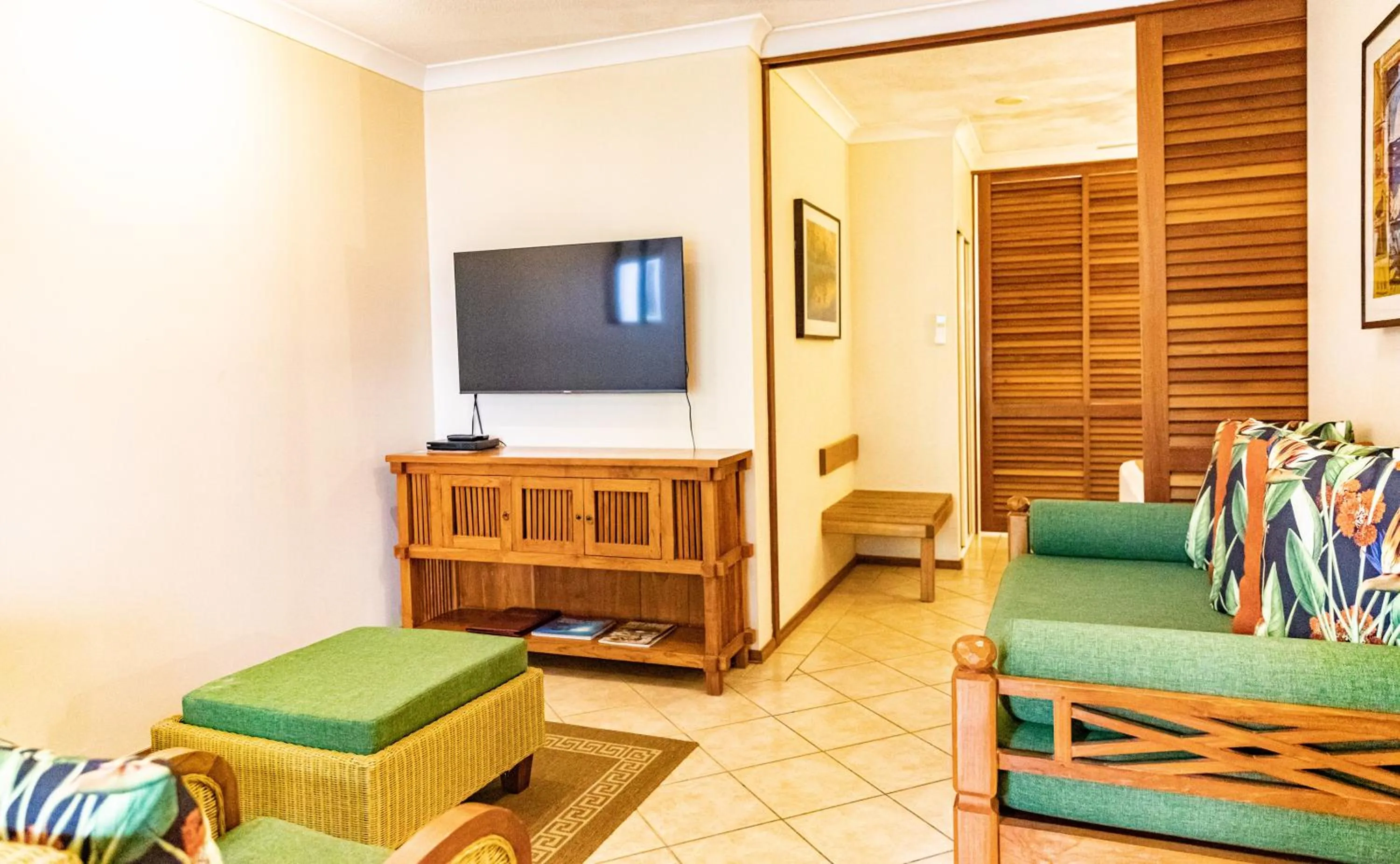 Communal lounge/ TV room in Hibiscus Resort & Spa - Official Onsite Reception & Check In