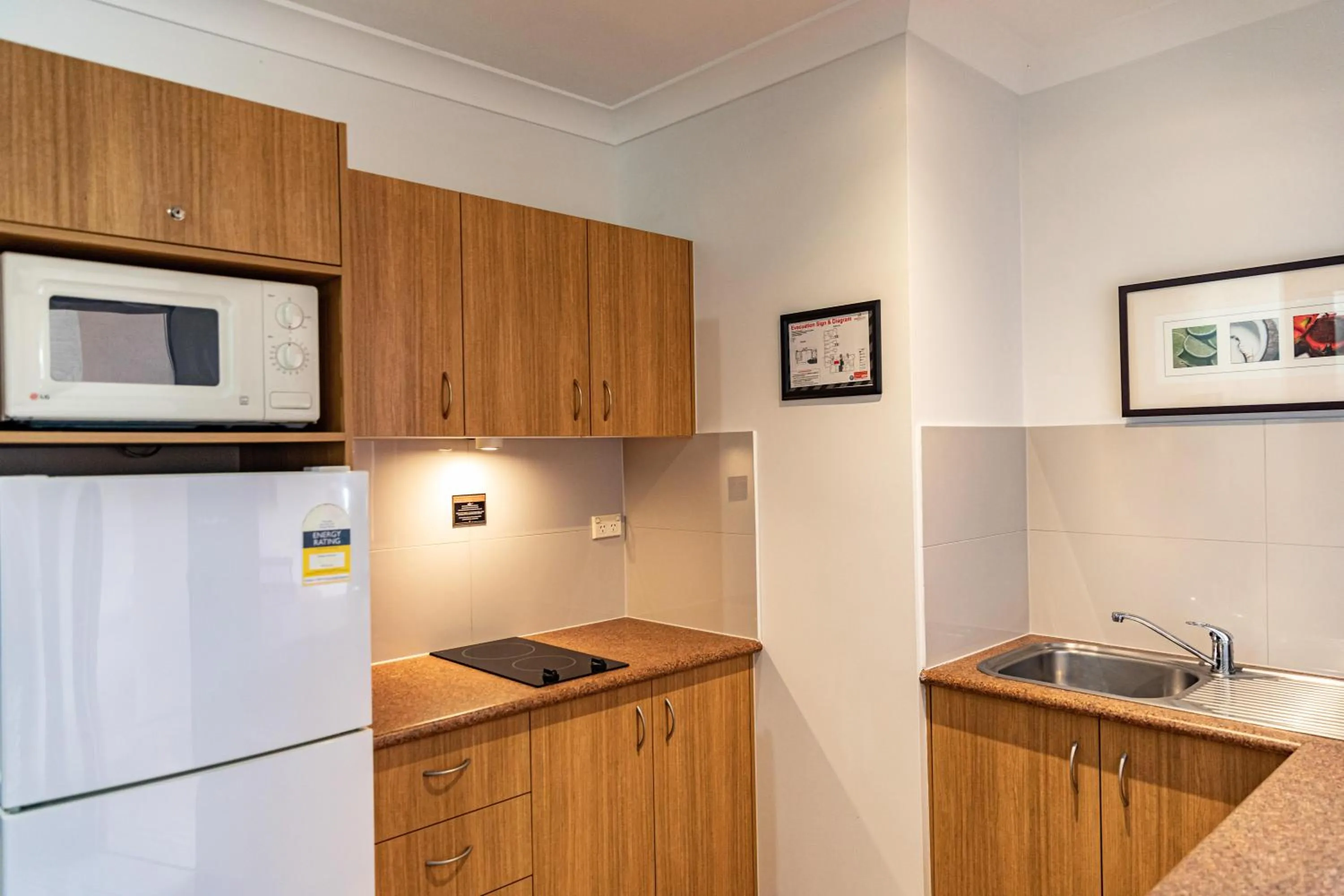 Kitchen or kitchenette in Hibiscus Resort & Spa - Official Onsite Reception & Check In