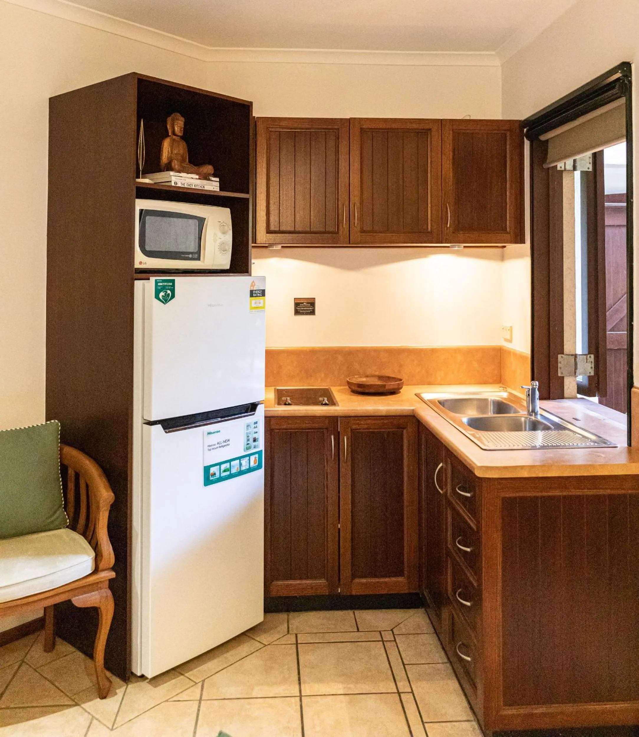 Kitchen or kitchenette in Hibiscus Resort & Spa - Official Onsite Reception & Check In