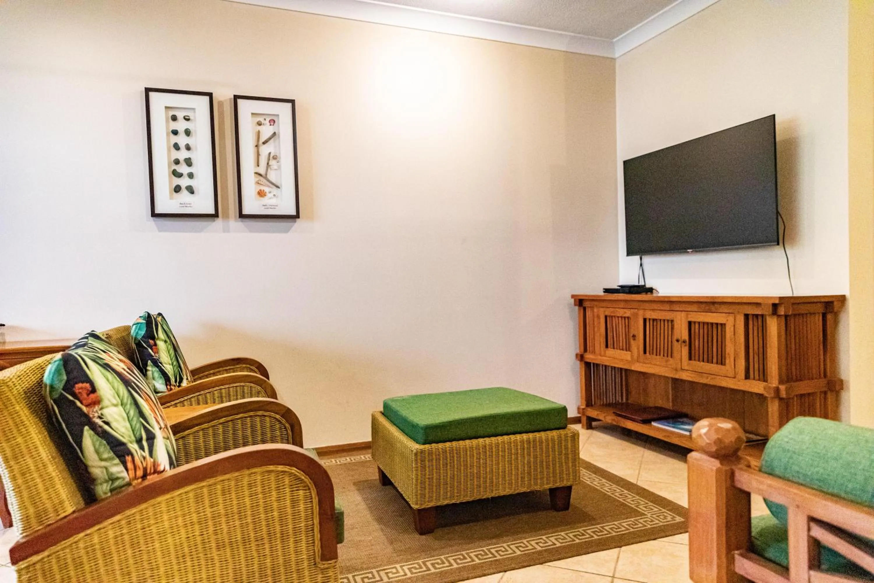 Communal lounge/ TV room in Hibiscus Resort & Spa - Official Onsite Reception & Check In