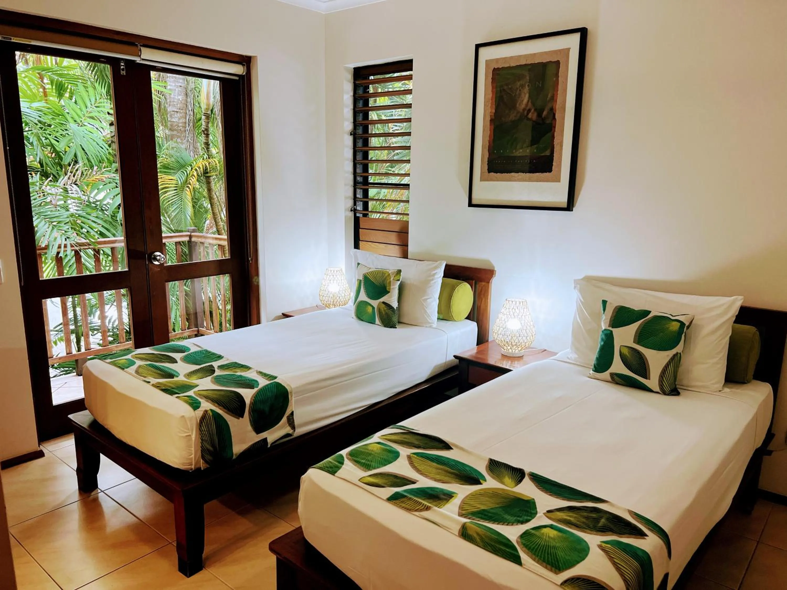 Bed in Hibiscus Resort & Spa - Official Onsite Reception & Check In