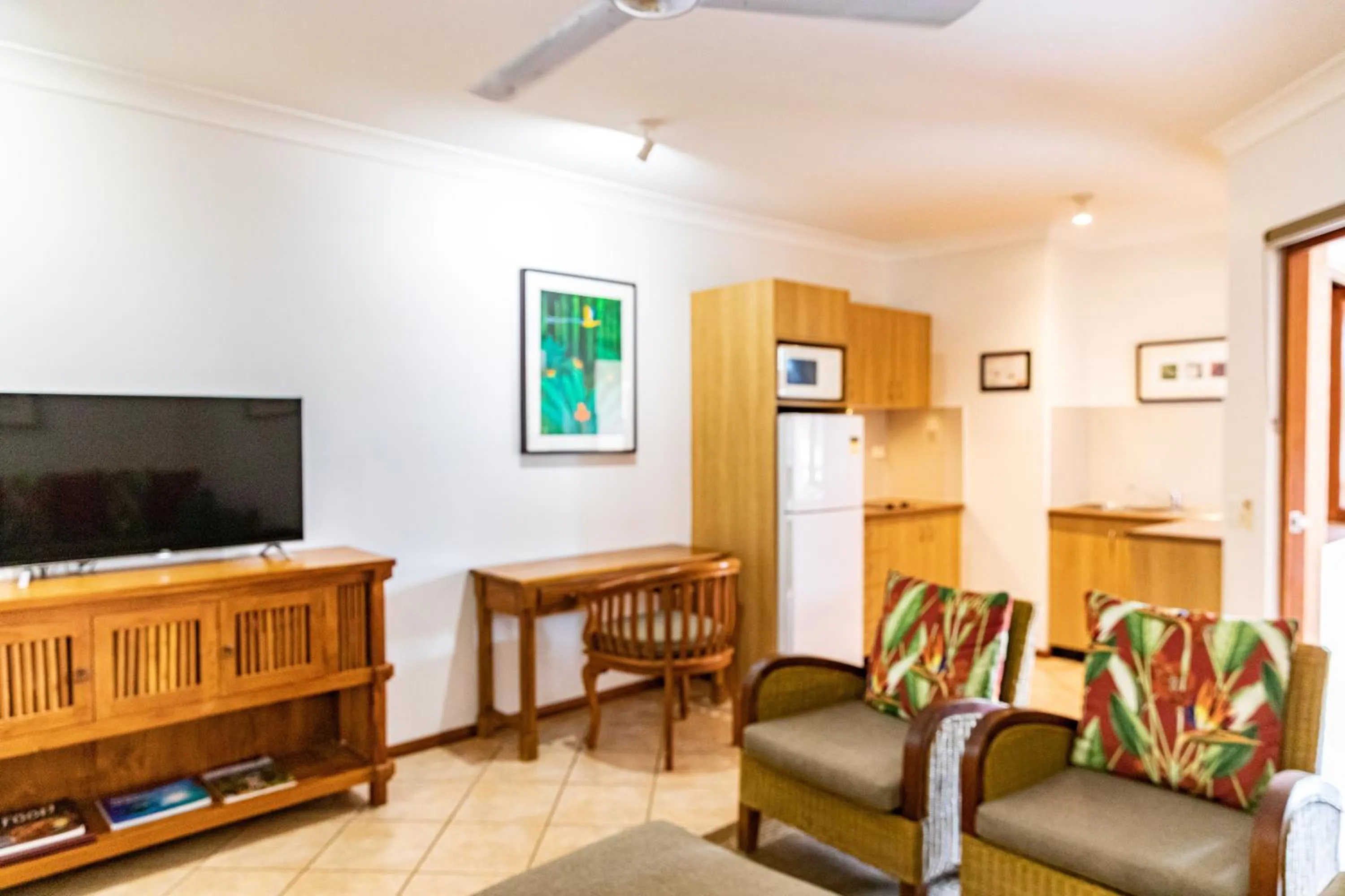 Communal lounge/ TV room in Hibiscus Resort & Spa - Official Onsite Reception & Check In