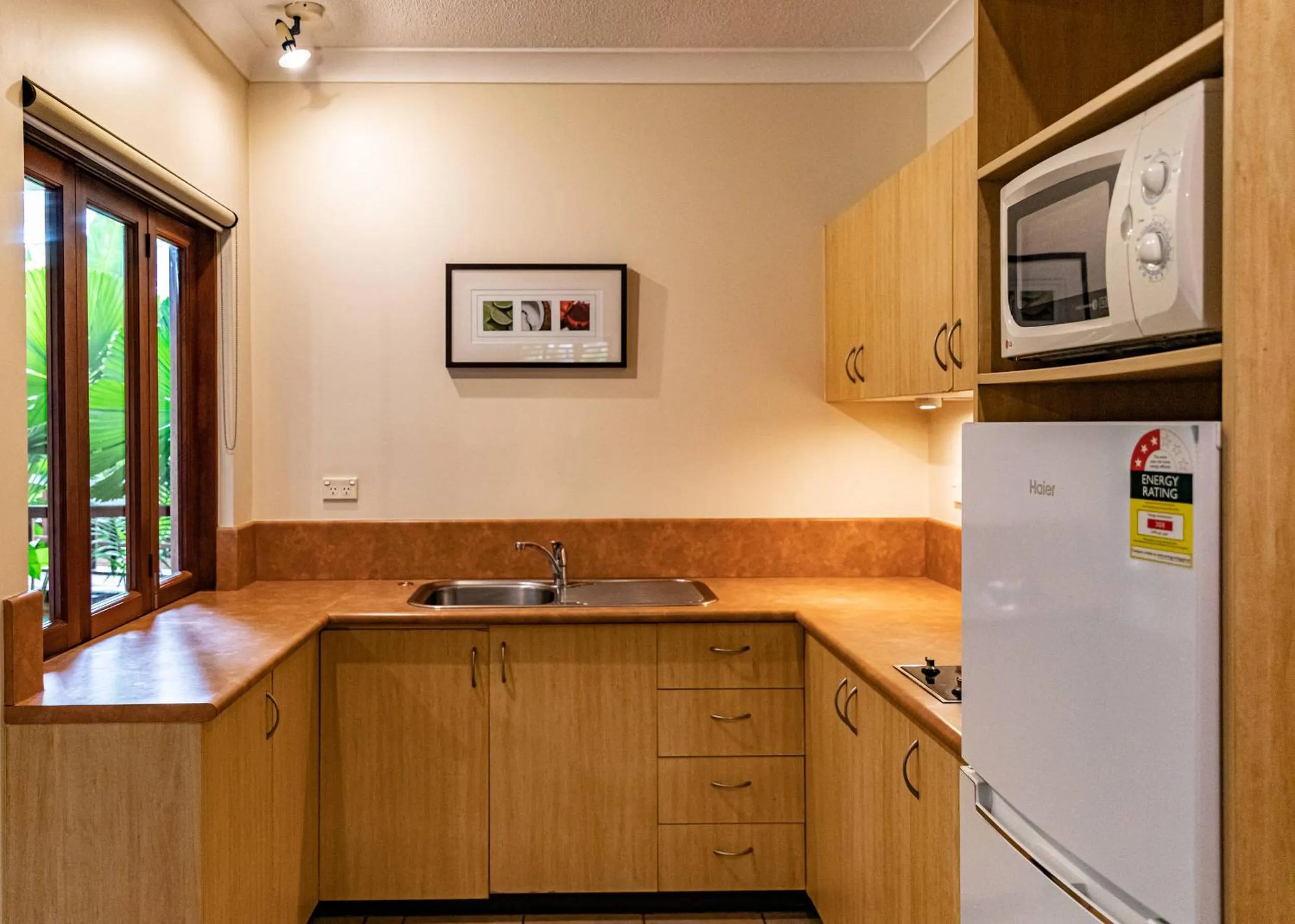 Kitchen or kitchenette in Hibiscus Resort & Spa - Official Onsite Reception & Check In