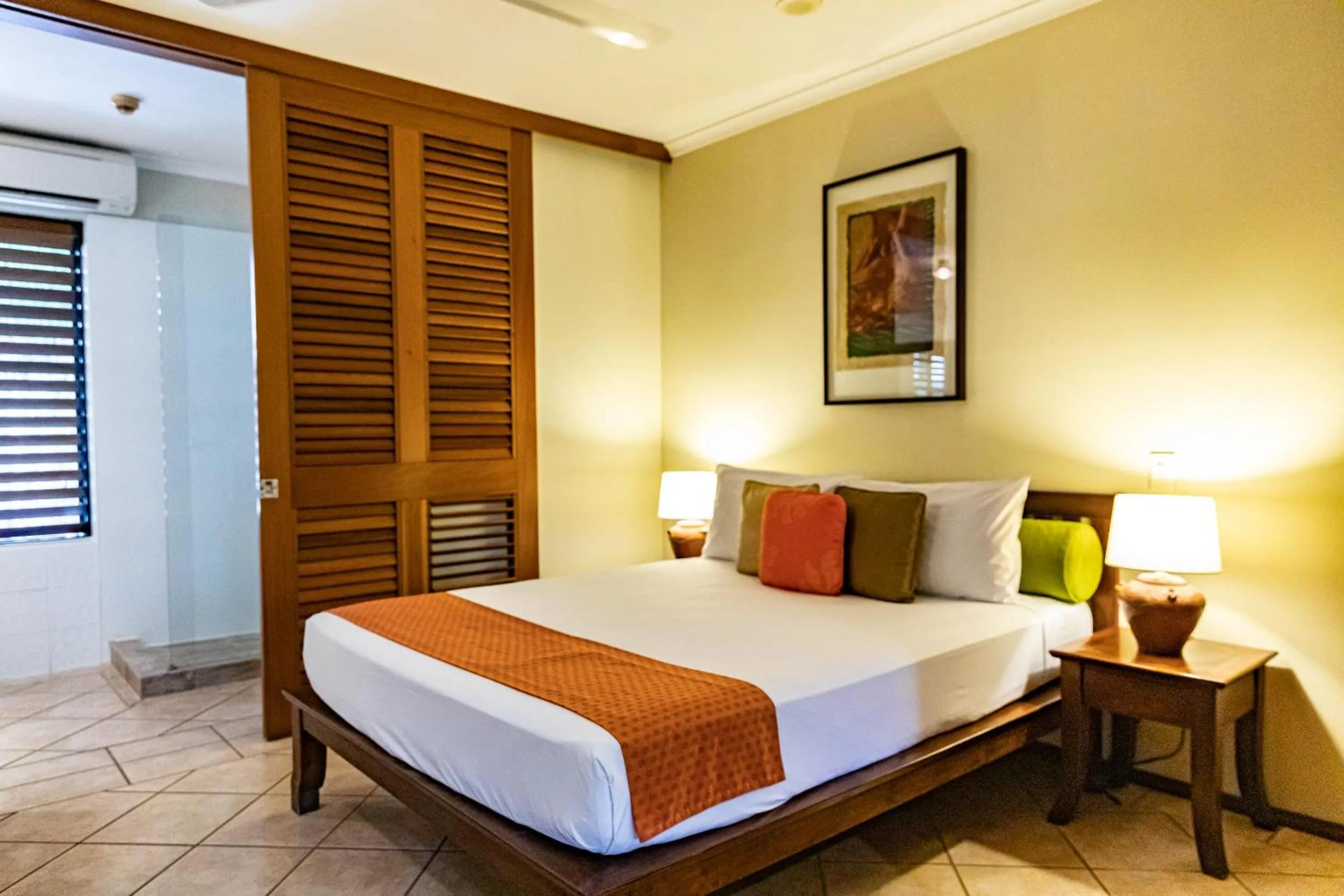 Bedroom, Bed in Hibiscus Resort & Spa - Official Onsite Reception & Check In