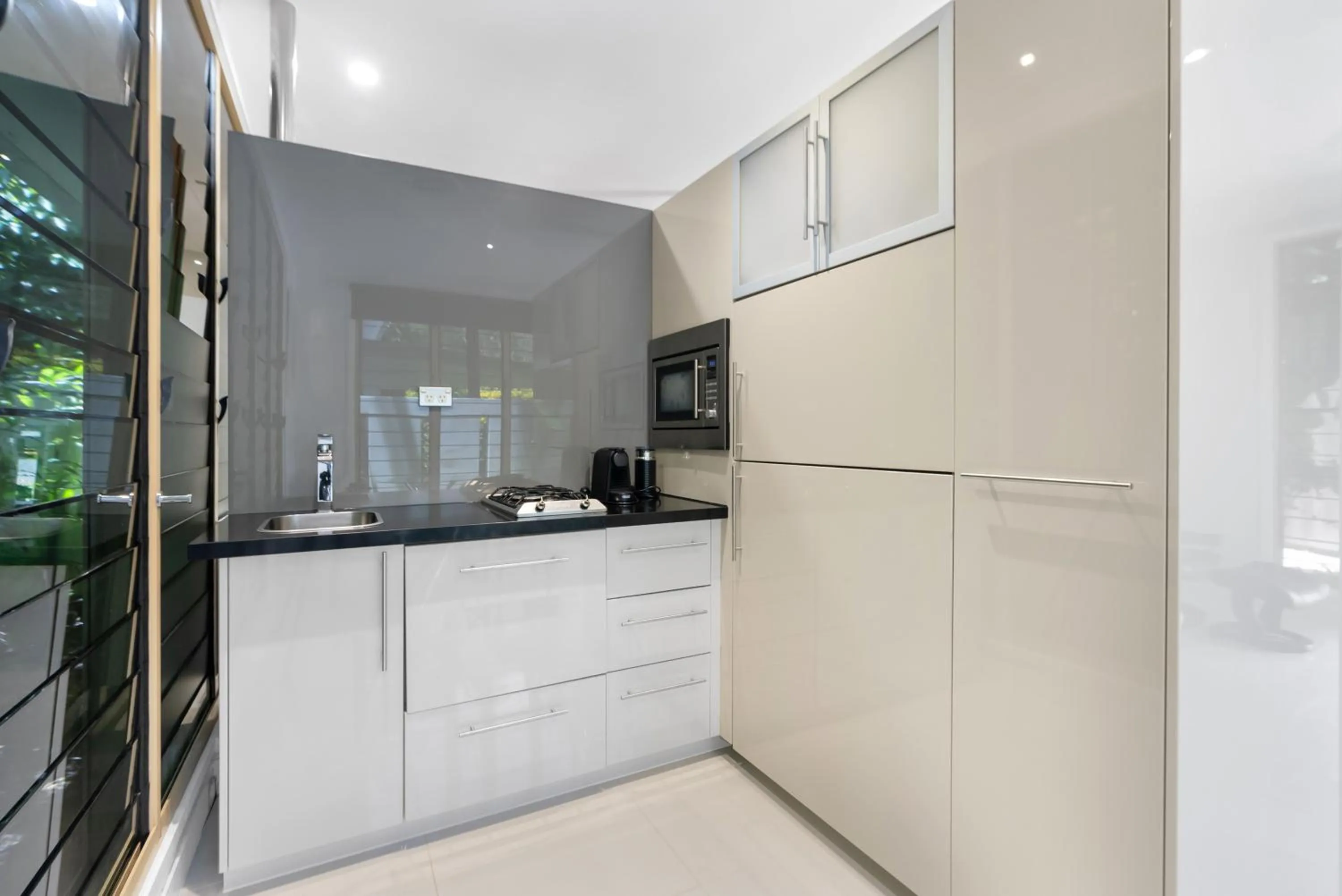 Kitchen or kitchenette in Sanctuary Palm Cove
