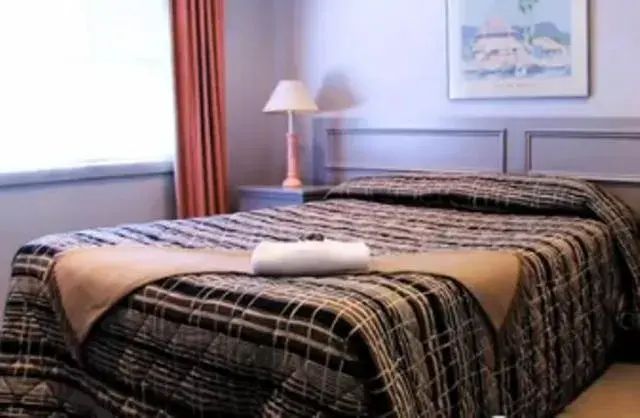 Bed in Clayton Monash Motor Inn & Serviced Apartments Bed in Clayton Monash Motor Inn & Serviced Apartments