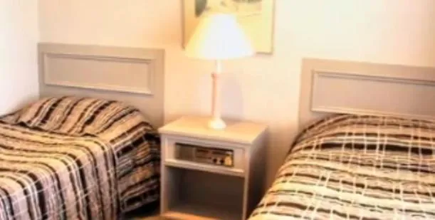 Bed in Clayton Monash Motor Inn & Serviced Apartments