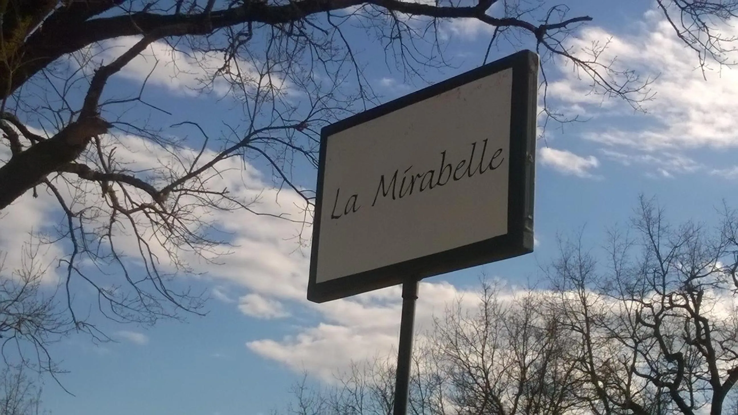 Property logo or sign in La Mirabelle