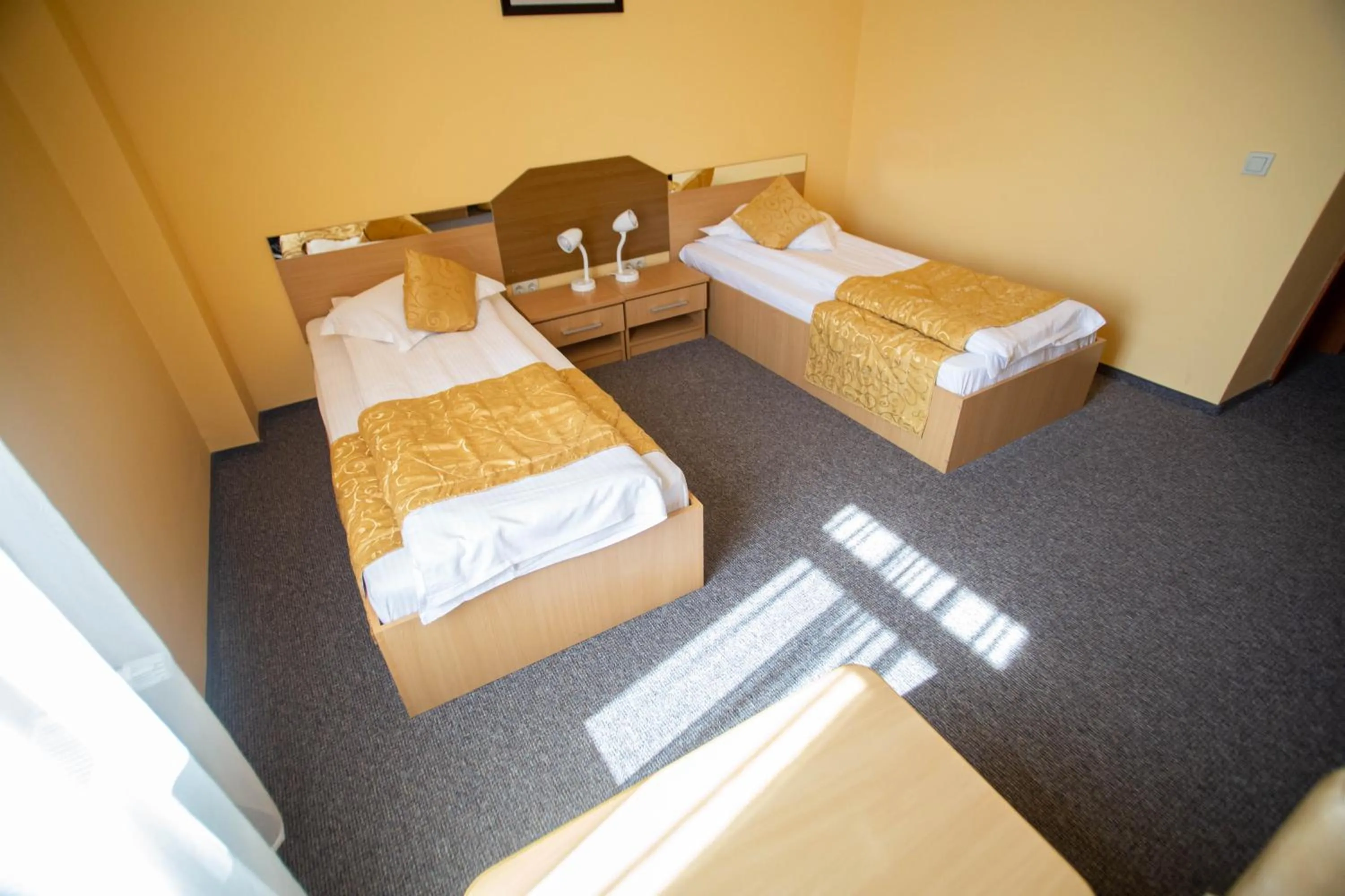 Bed in Hotel Alexandra