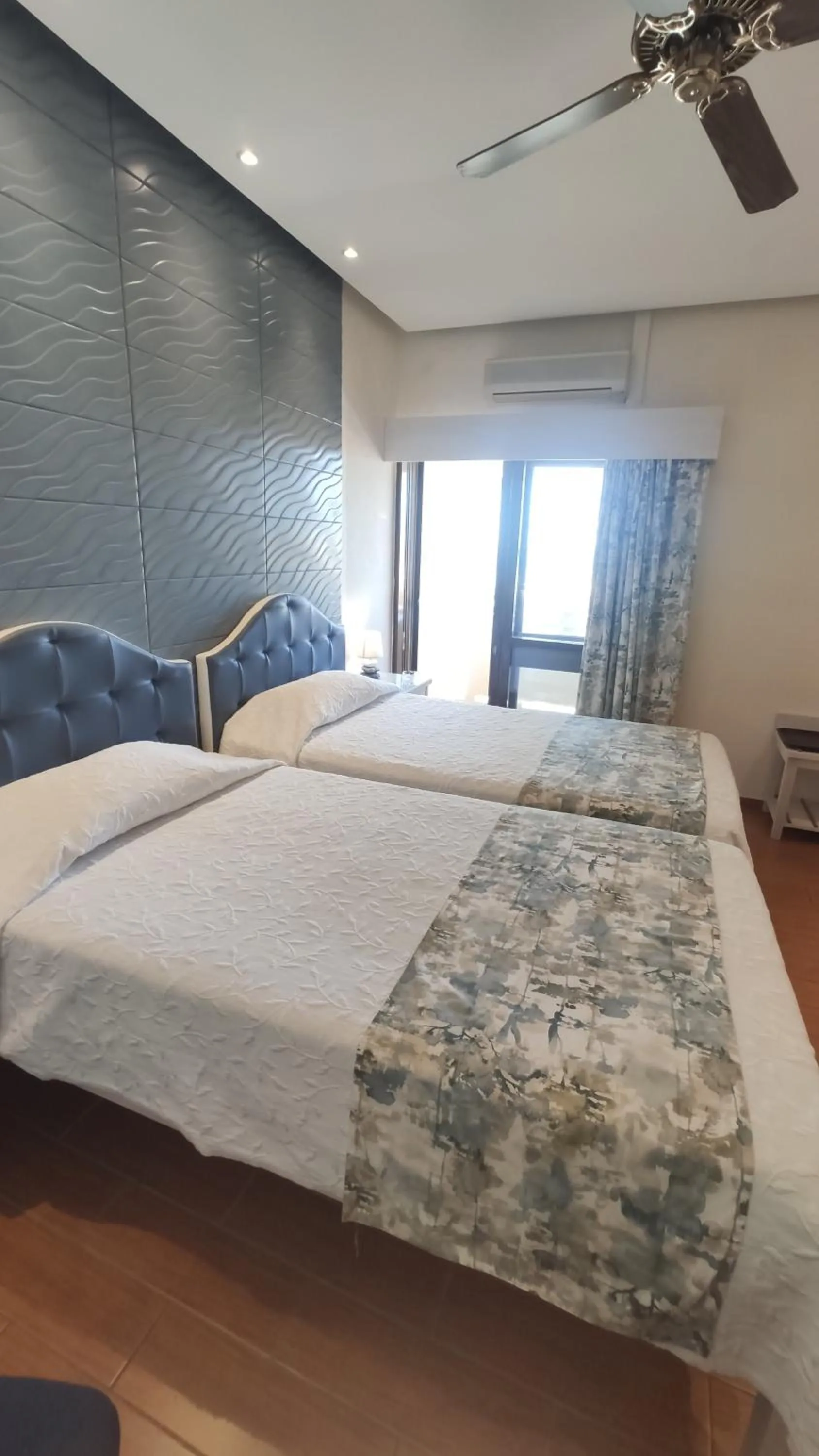 Bed in Aeromar Beach Hotel